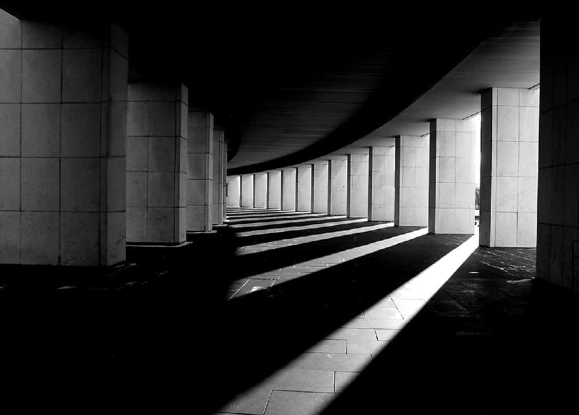 1128x809 Download Caption: Stunning Black and White Architectural Masterpiece Wallpaper