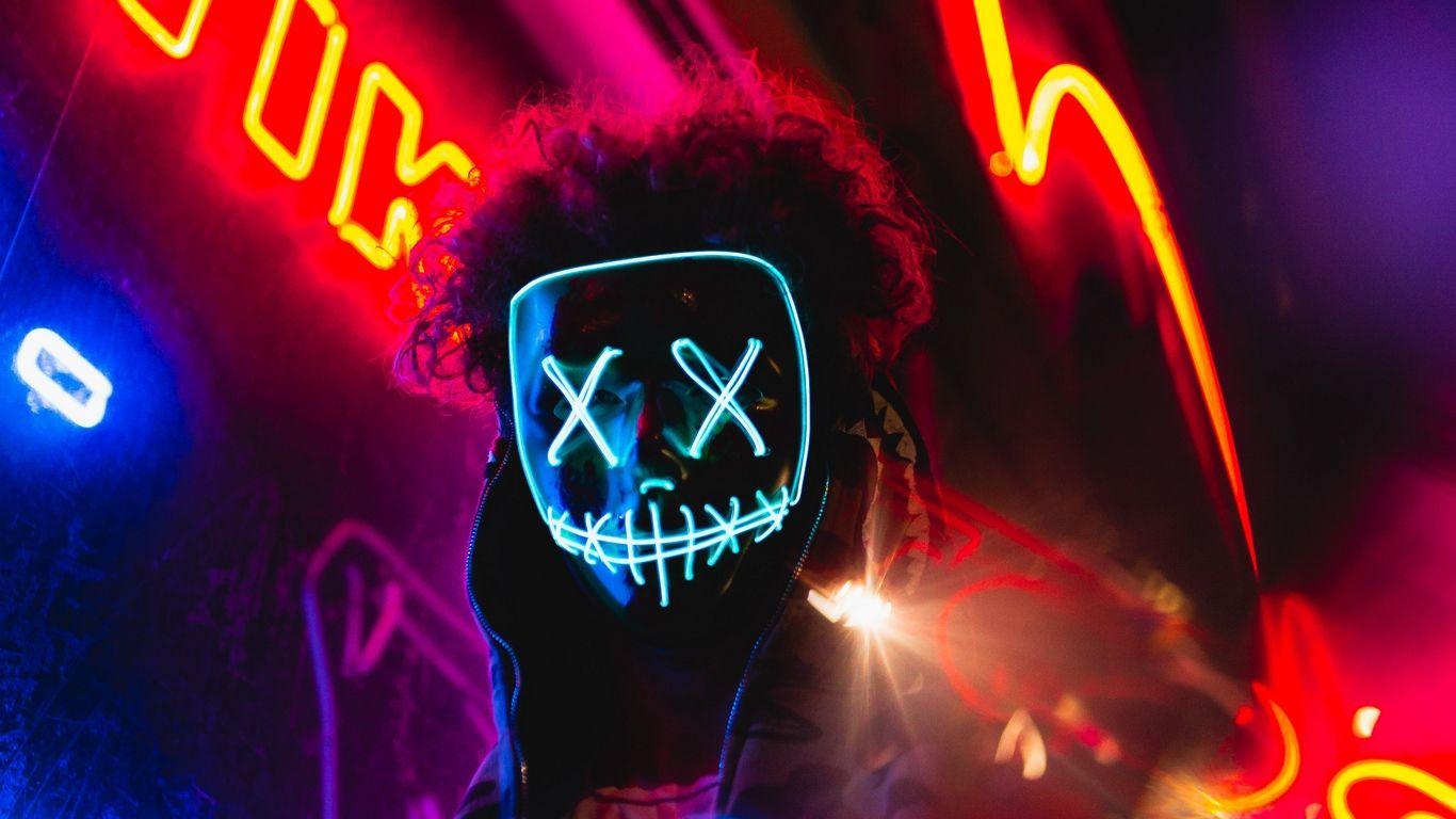 1366x768 Download wallpaper 1366x768 mask, neon, anonymous, light, man
