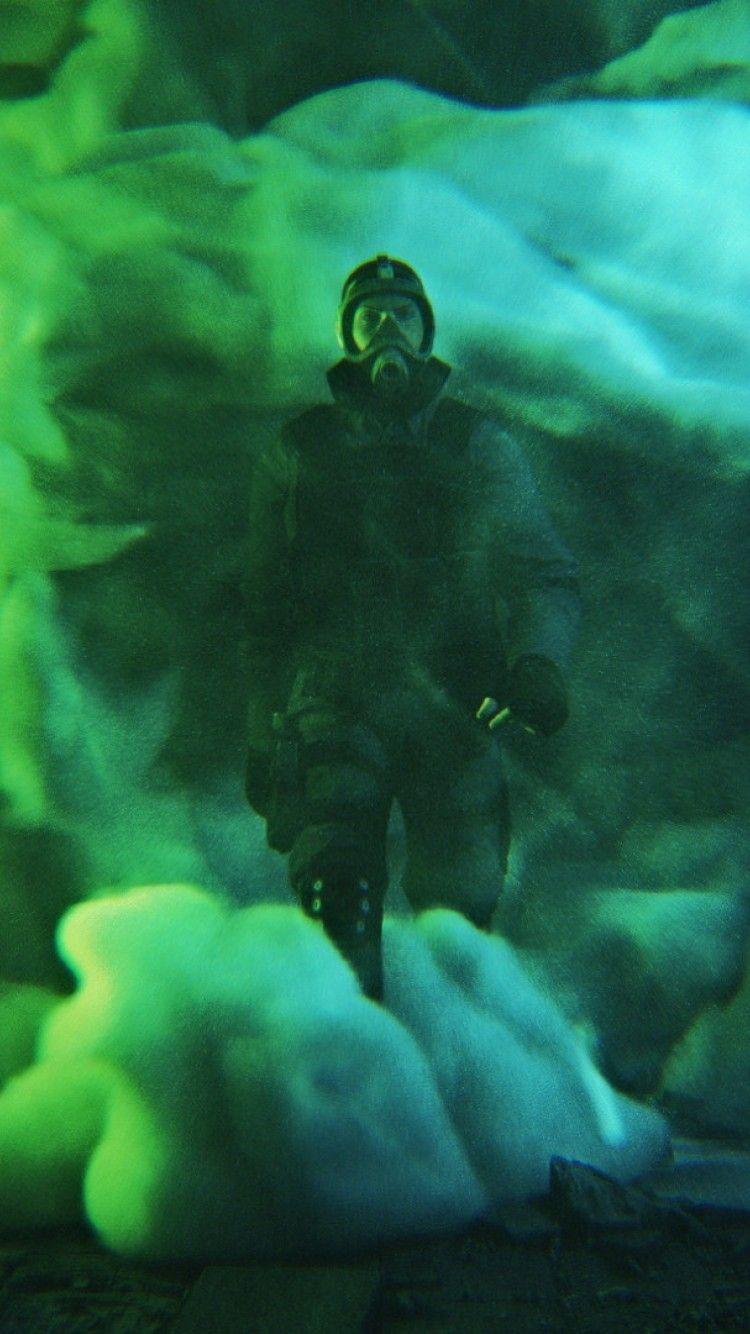 750x1334 Masked man walking through smoke HD Wallpaper iPhone 6 / 6S