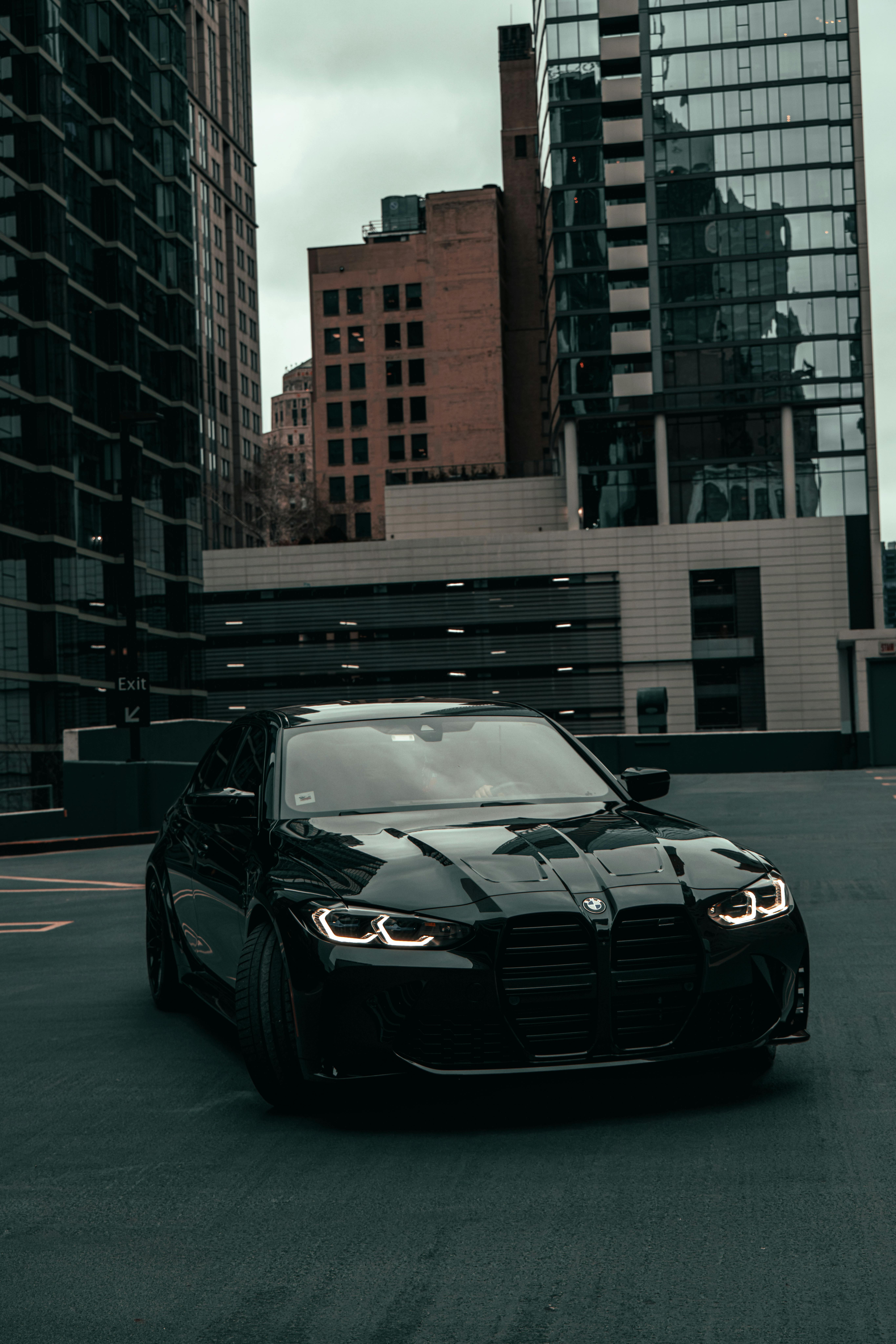 5464x8192 Sleek Black BMW in Chicago Urban Setting · Free