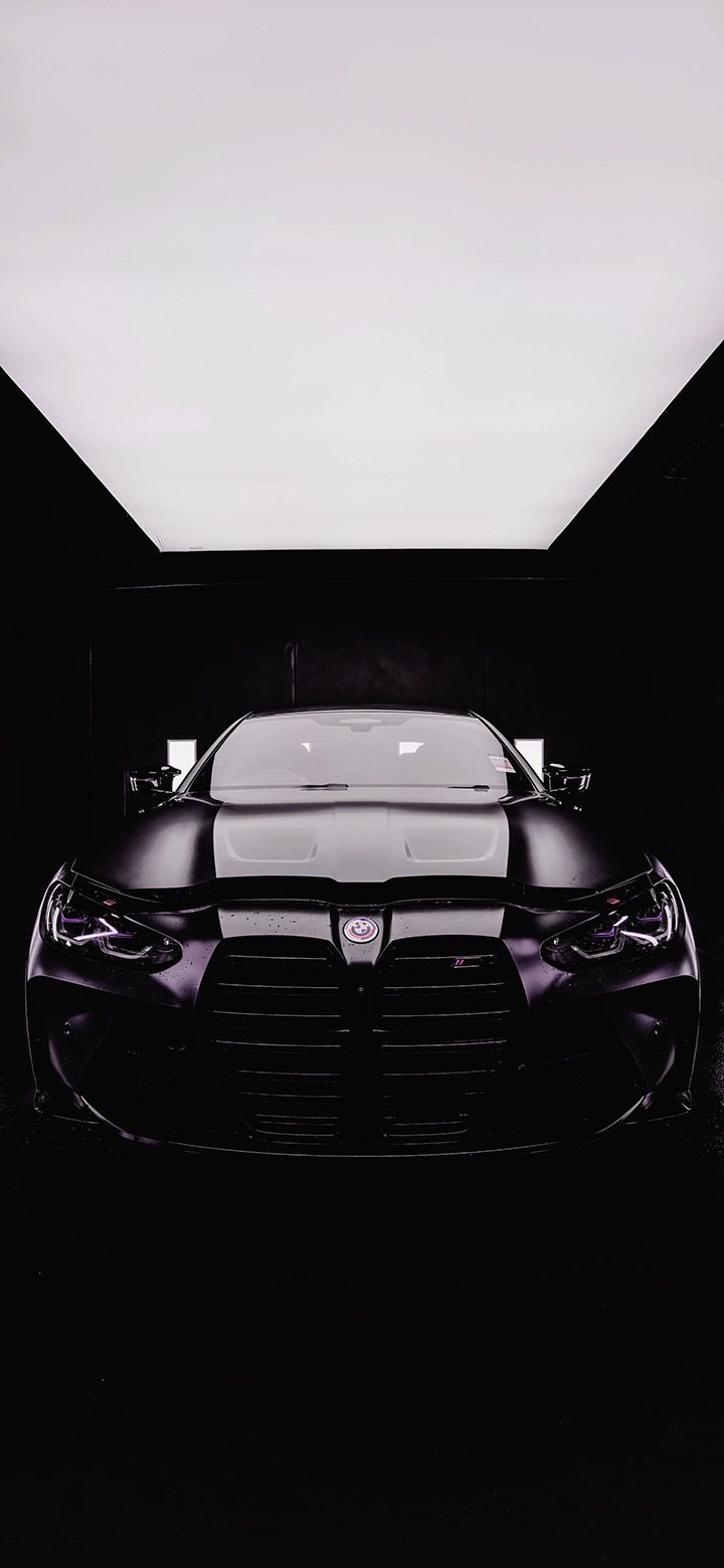 720x1560 Black BMW In A Dark Room 4K phone Wallpaper