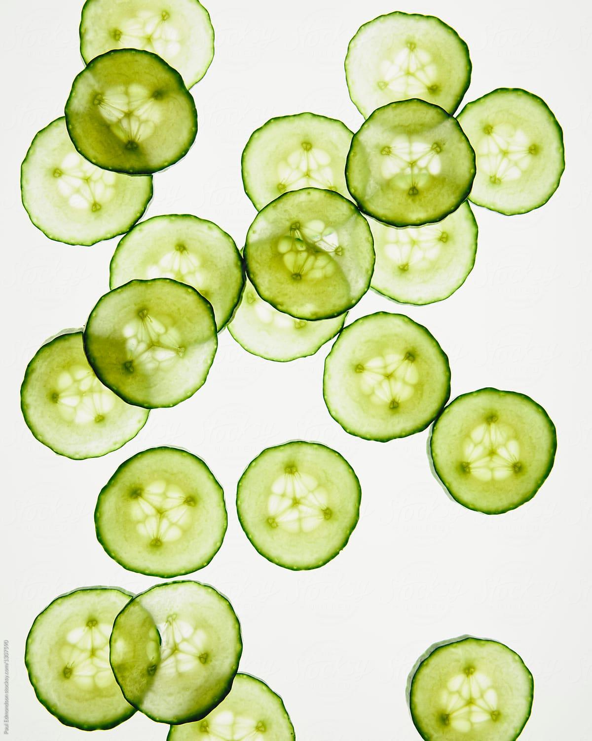 1200x1500 Thinly sliced cucumber of white backdrop