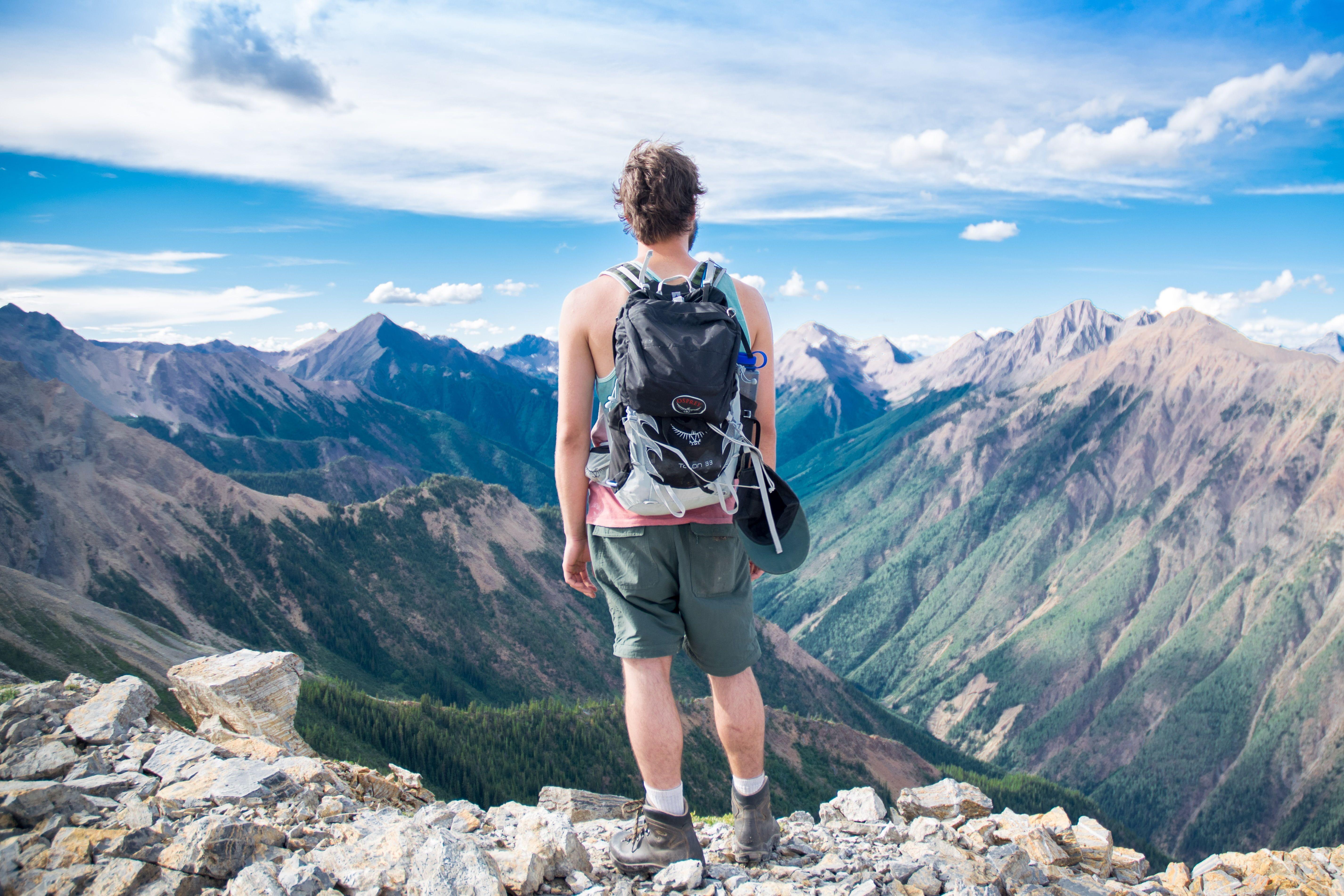 5704x3803 Man climbing while holding pick axe painting HD wallpaper