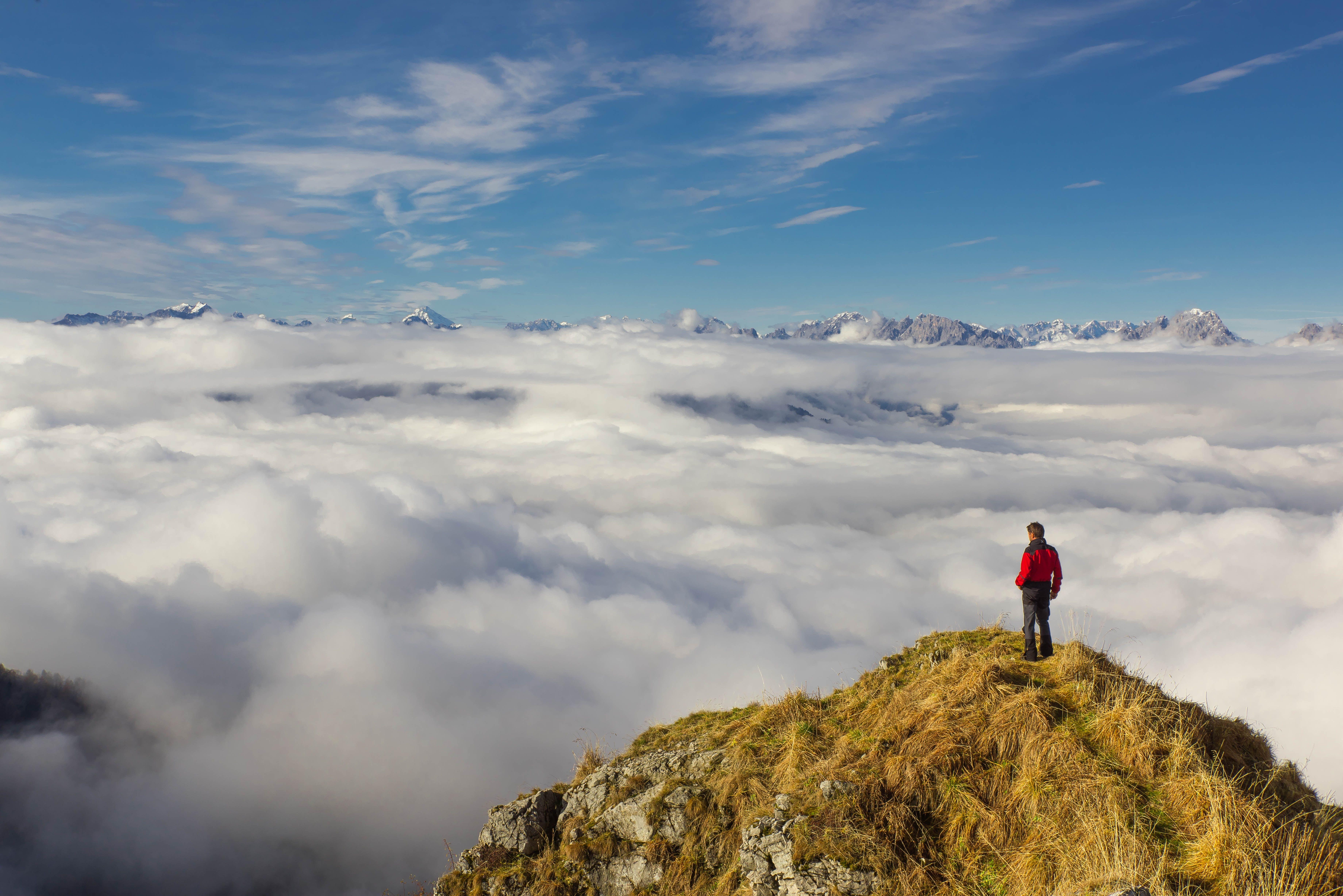 7360x4912 Man Standing on Mountain Against Sky · Free