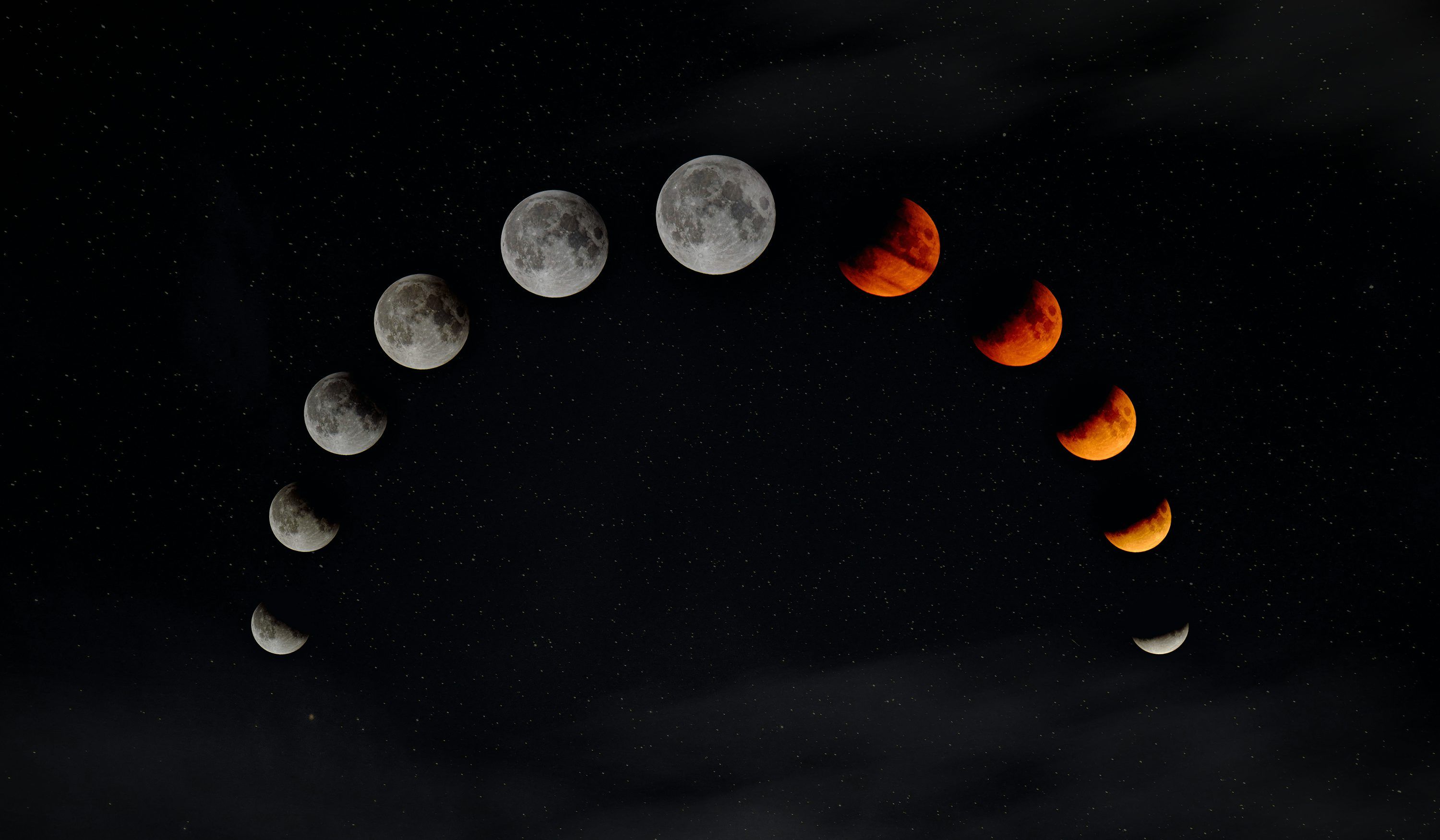 3000x1750 A group of phases of the moon in the night sky photo