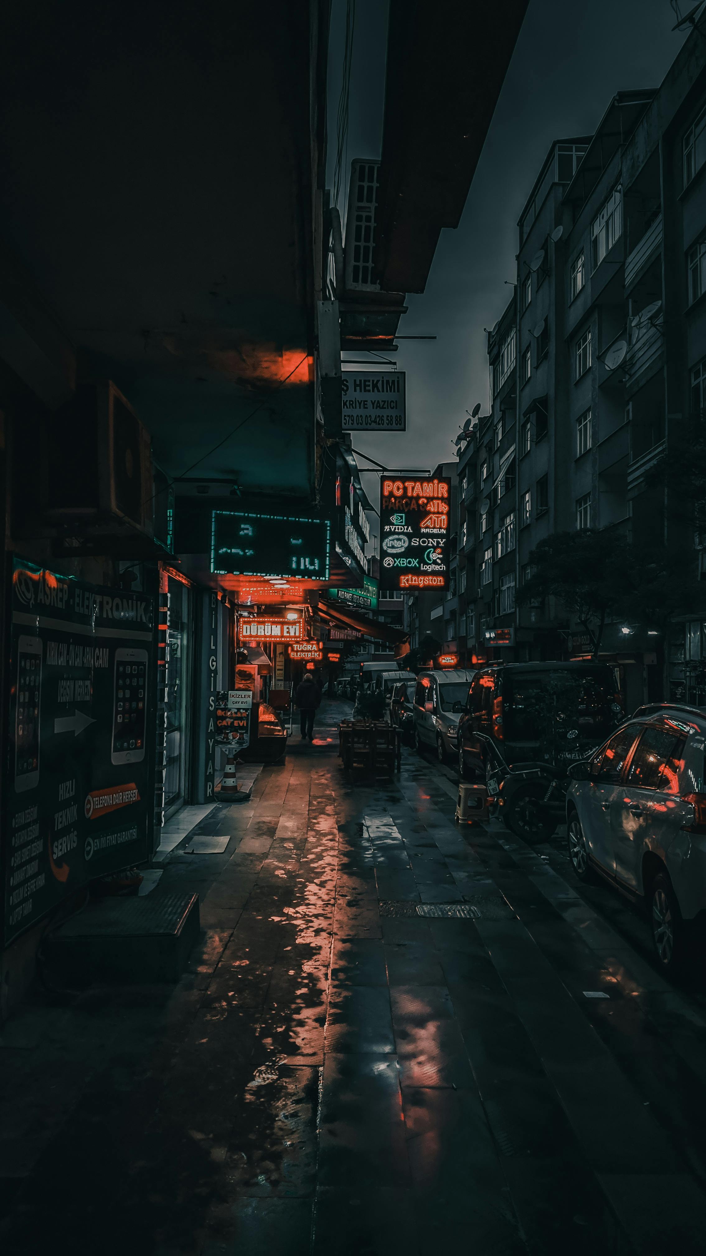 2268x4032 City street with cars and buildings at night · Free