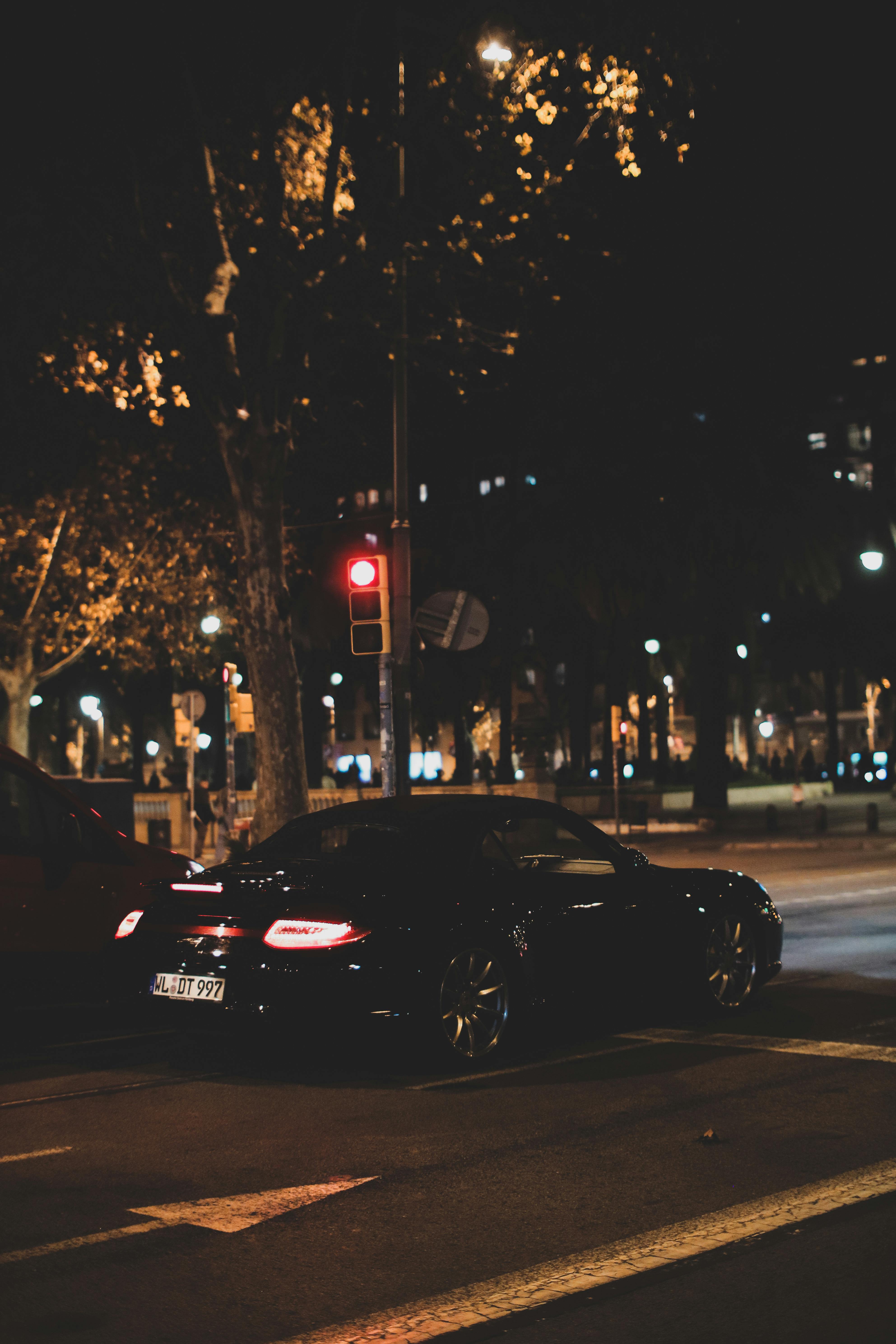 3970x5954 A Black Car on the Road · Free