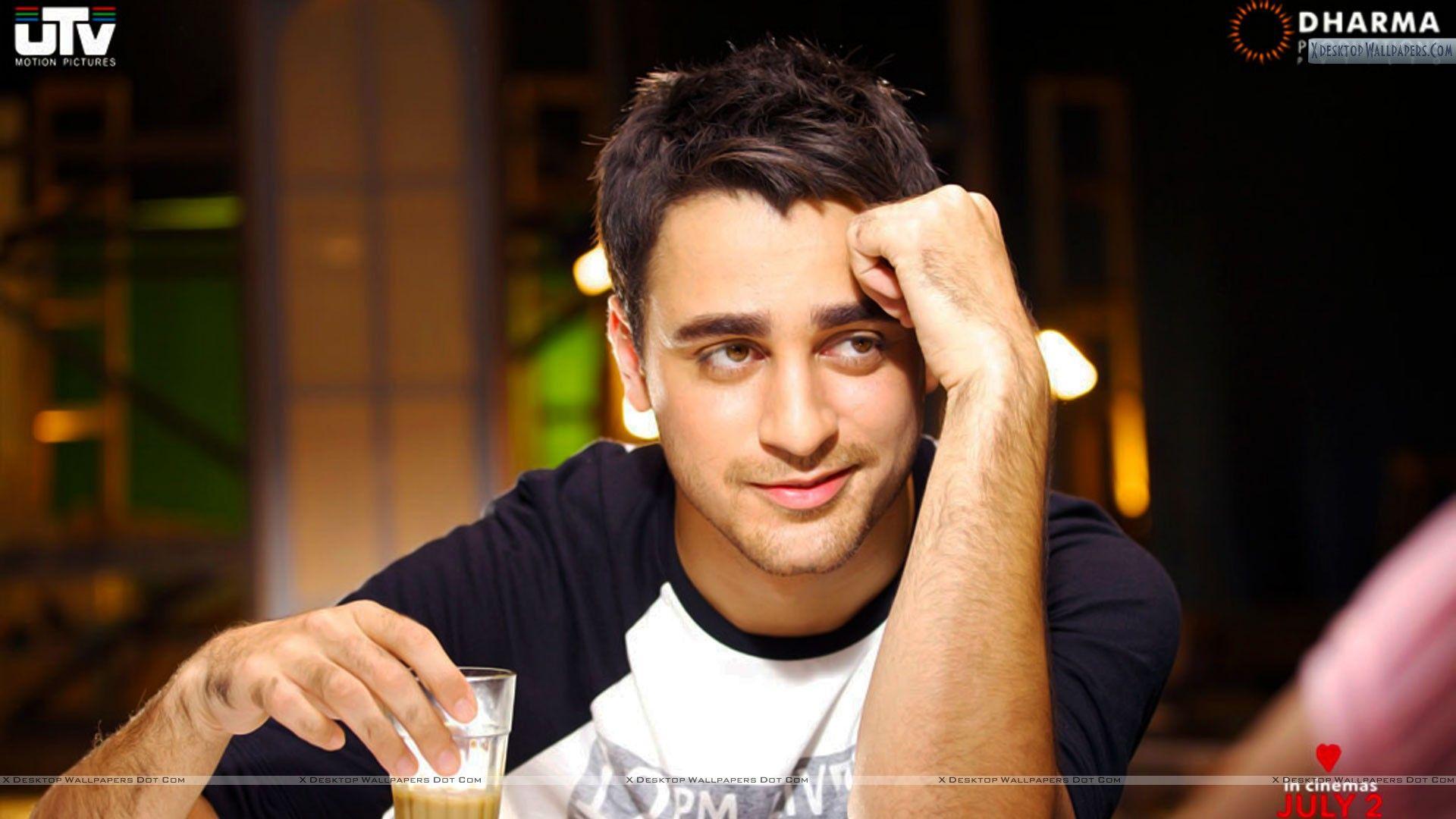1920x1080 Imran Khan Drinking Tea And Smiling Wallpaper