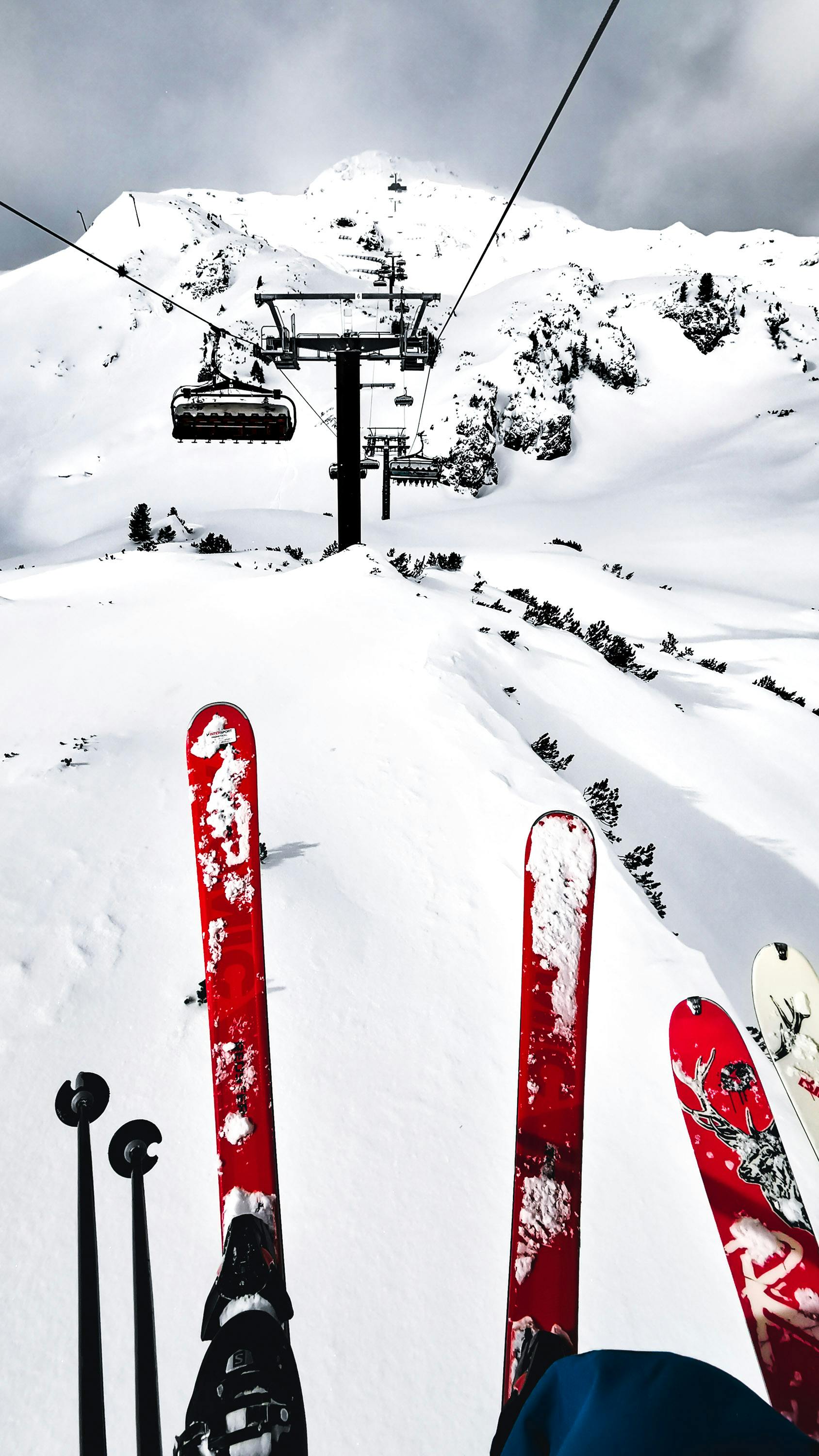 1688x3000 Skier on Ski Lift in Austria · Free