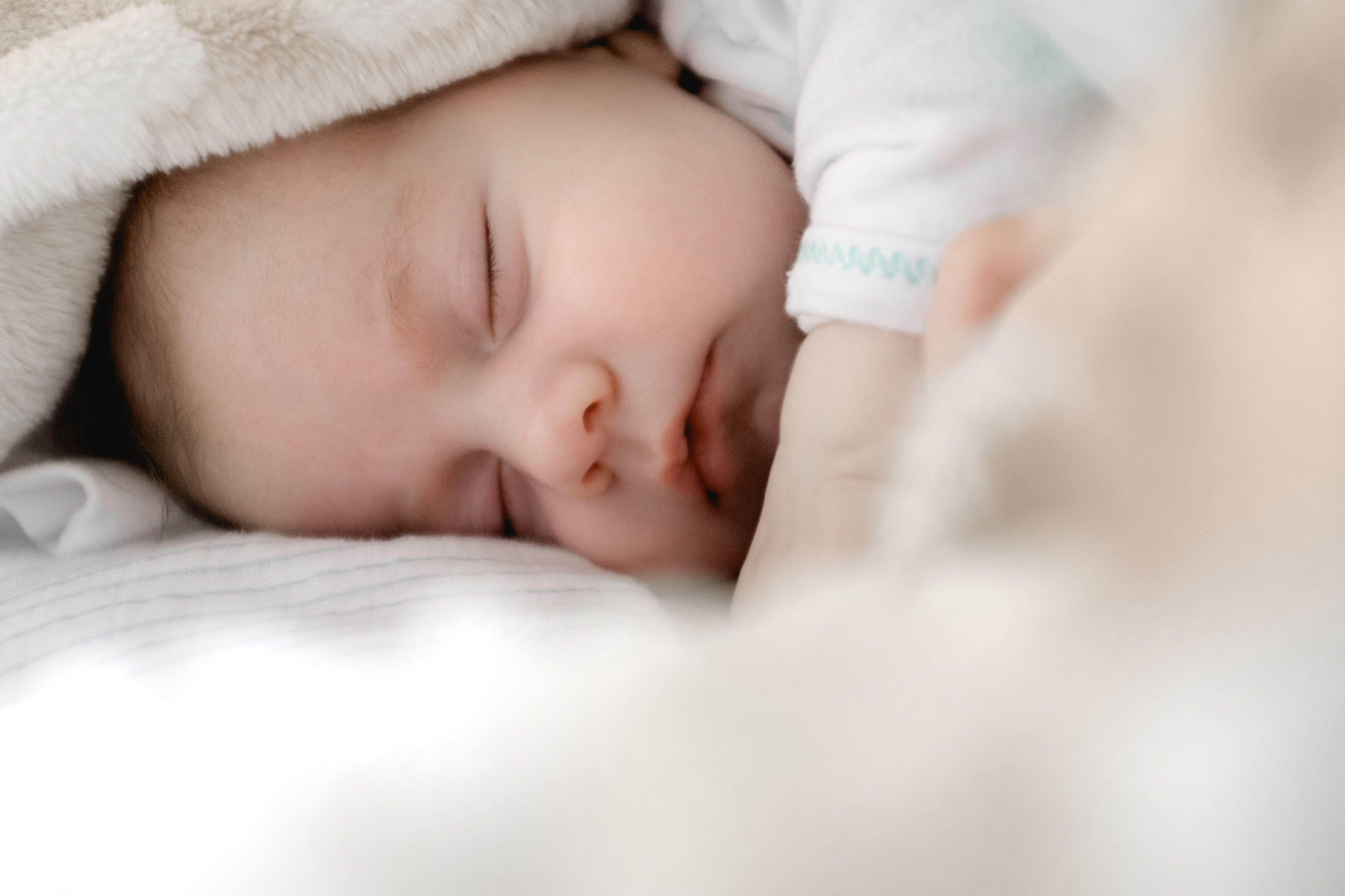 6000x4000 selective focus photography of sleeping baby photo