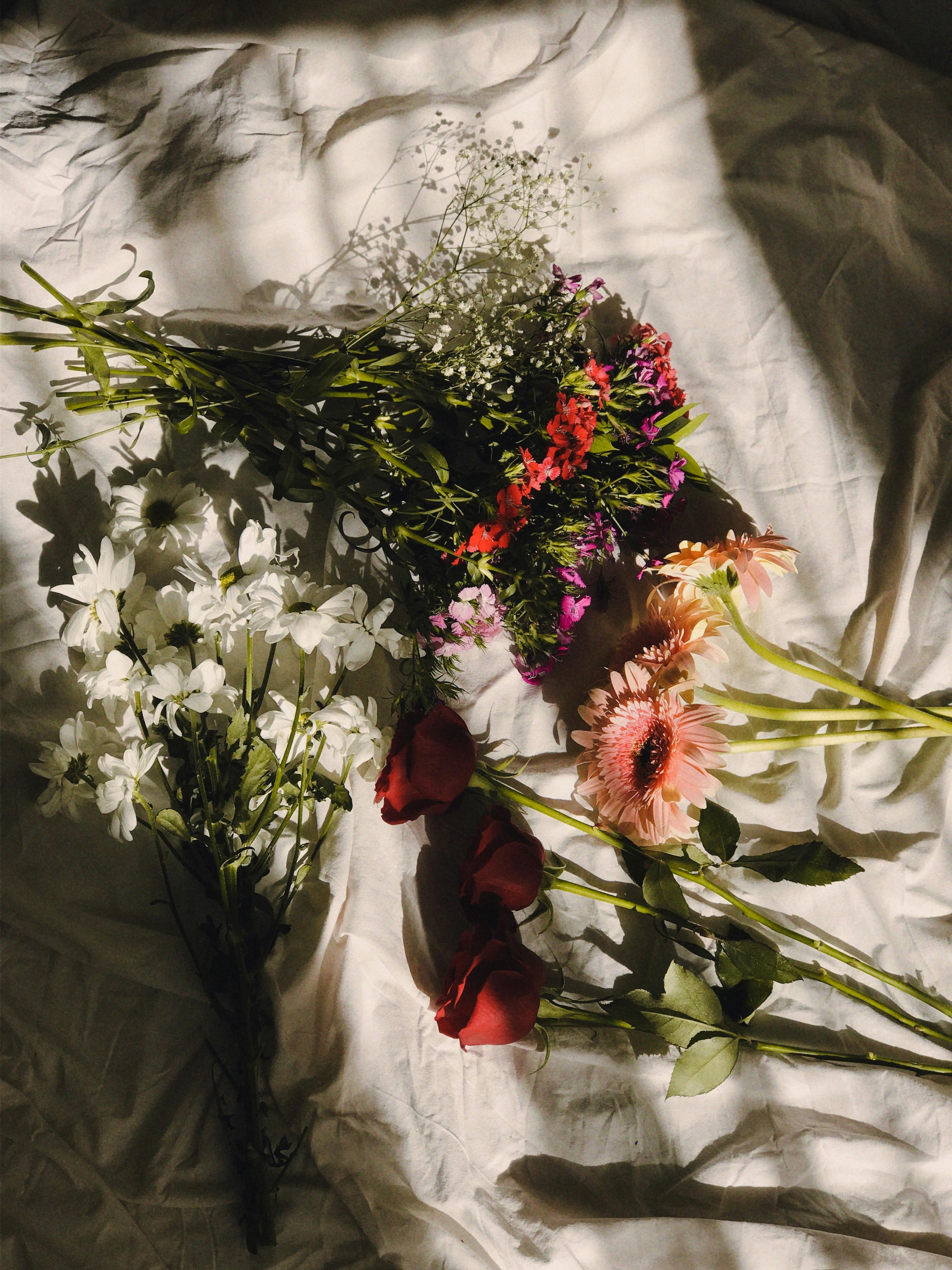 3024x4032 Bouquets of Different Flowers on White Sheet · Free
