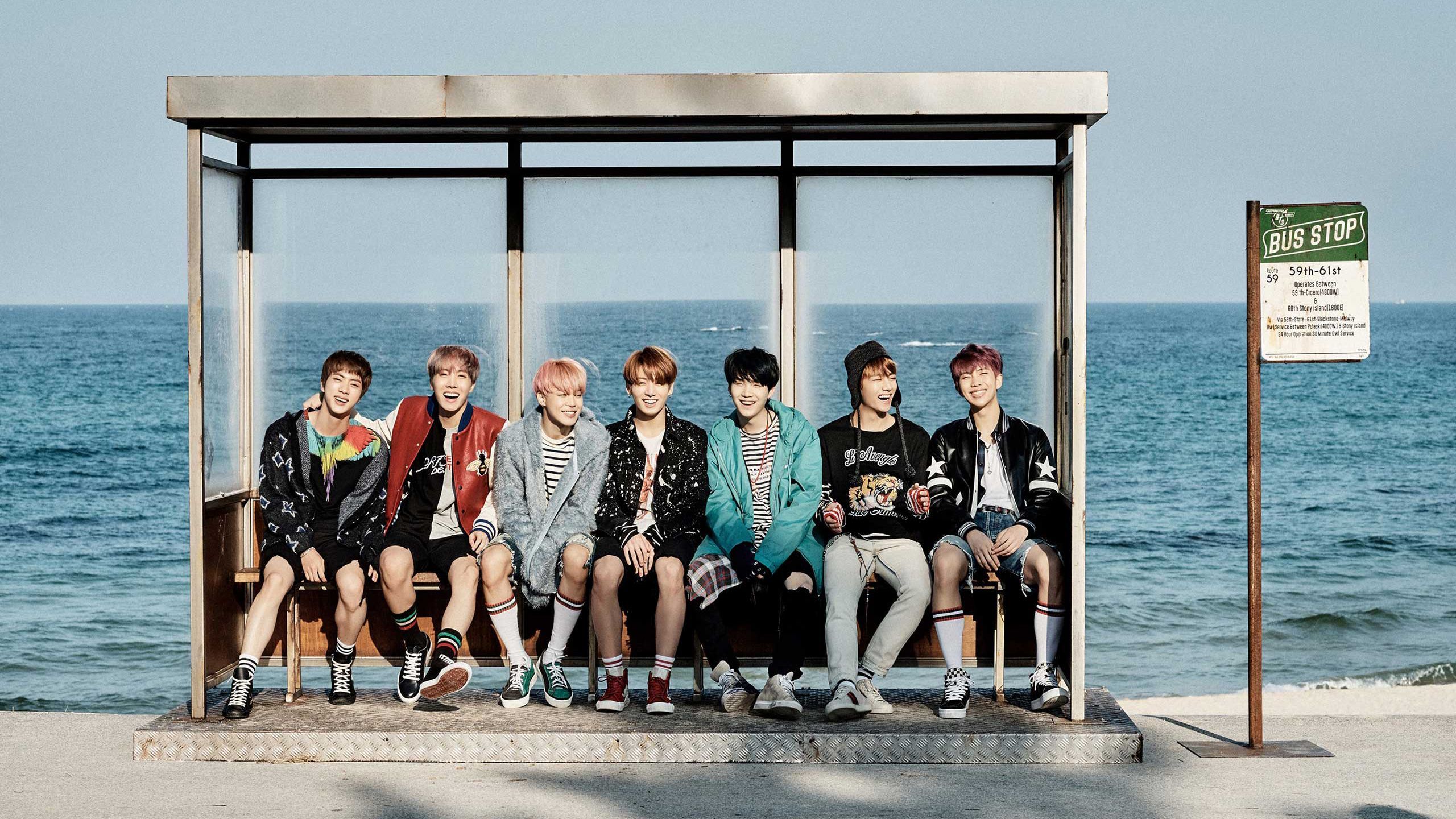 2560x1440 Bangtan Boys Are Sitting In Ocean Background HD BTS Wallpaper