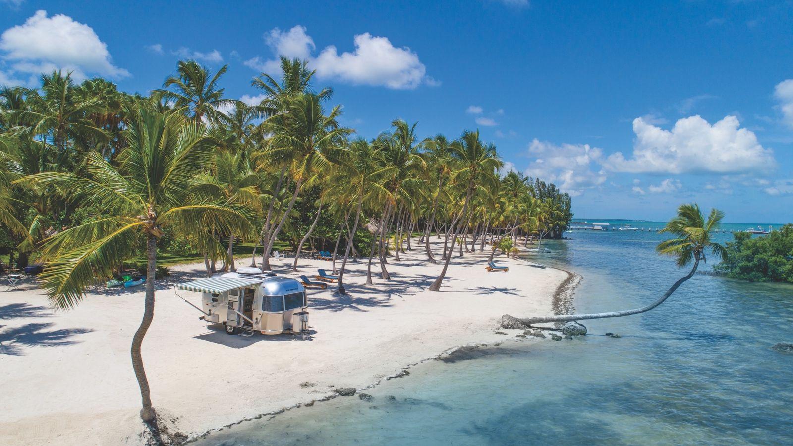 1600x900 Download wallpaper 1600x900 palms, tropics, paradise, rest, ocean