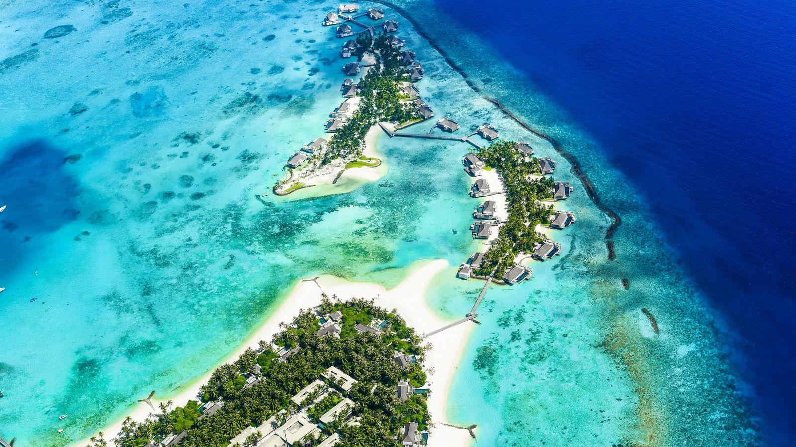 1600x900 Download wallpaper 1600x900 island, ocean, aerial view, coast
