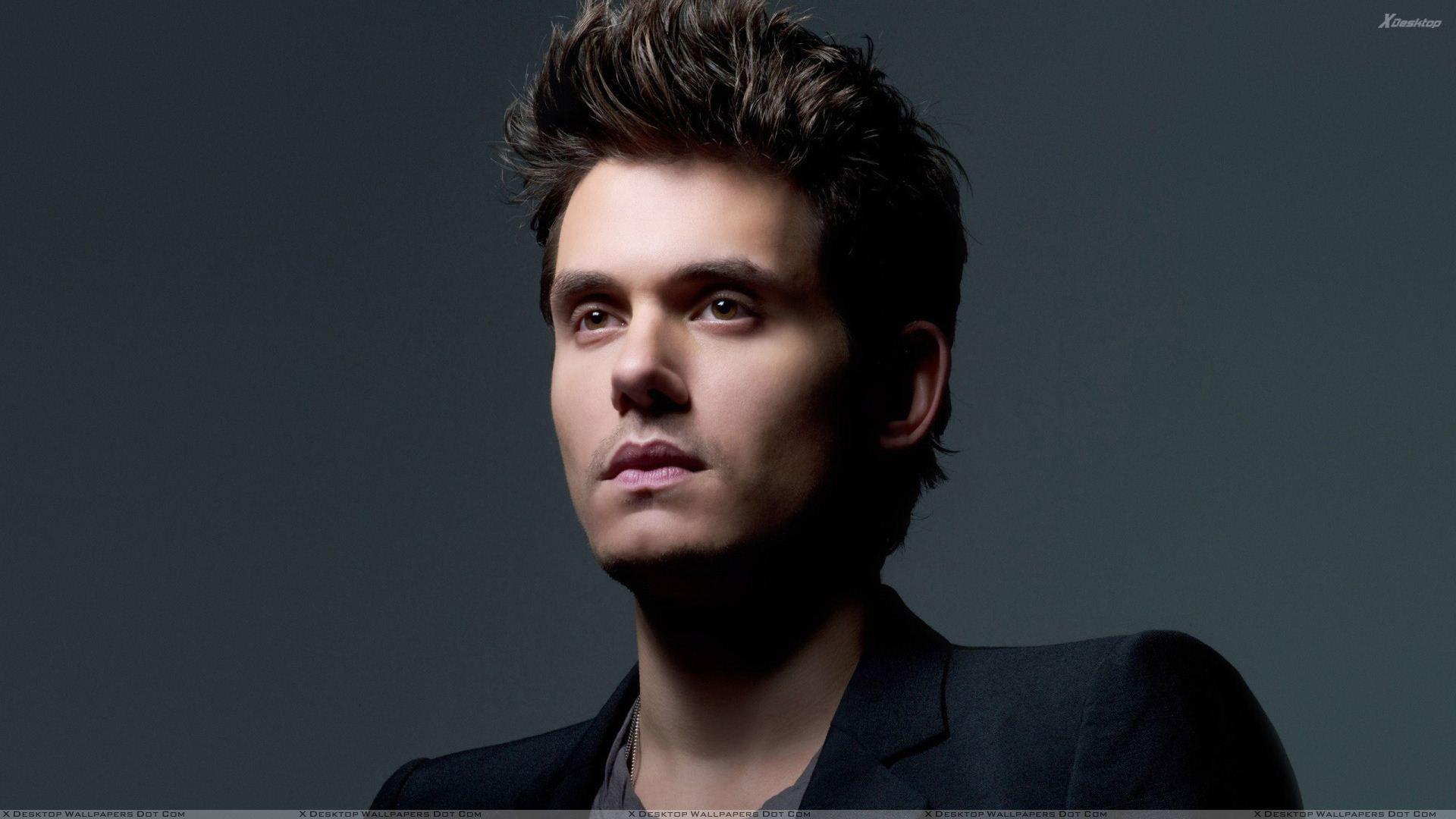 1920x1080 John Mayer Sad Face In Black Coat Wallpaper