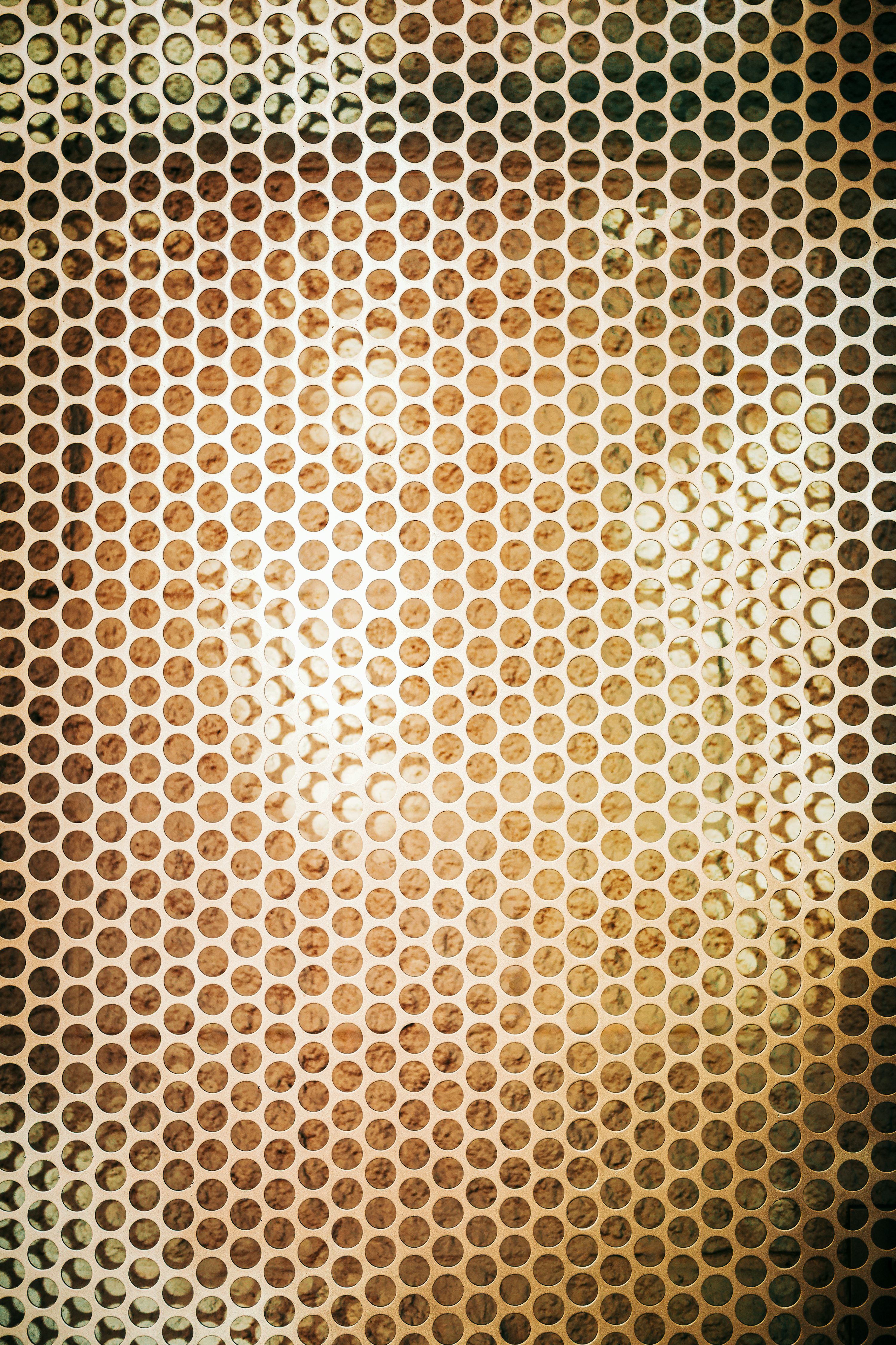 3000x4500 Perforated metal grid with textured background photo