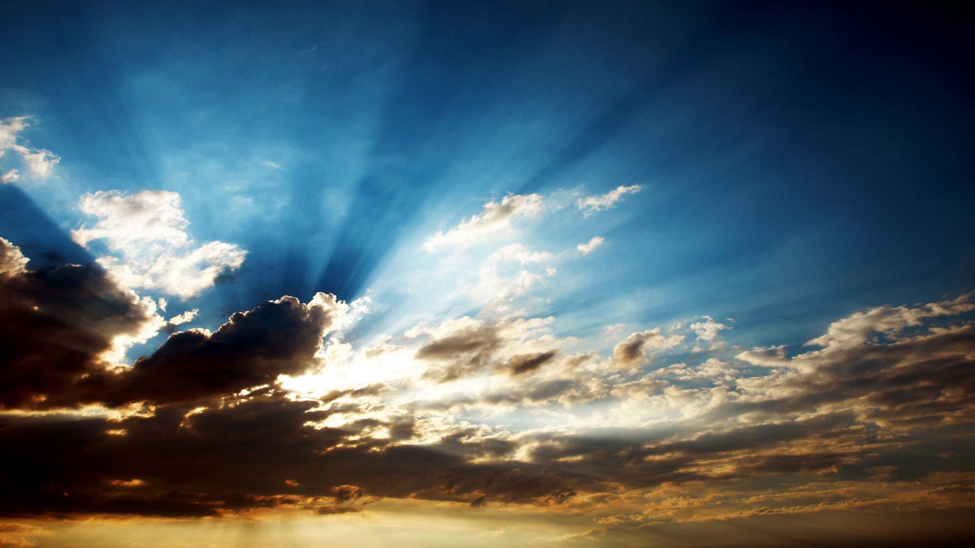 1920x1080 Sun Rays Through Clouds Wallpaper