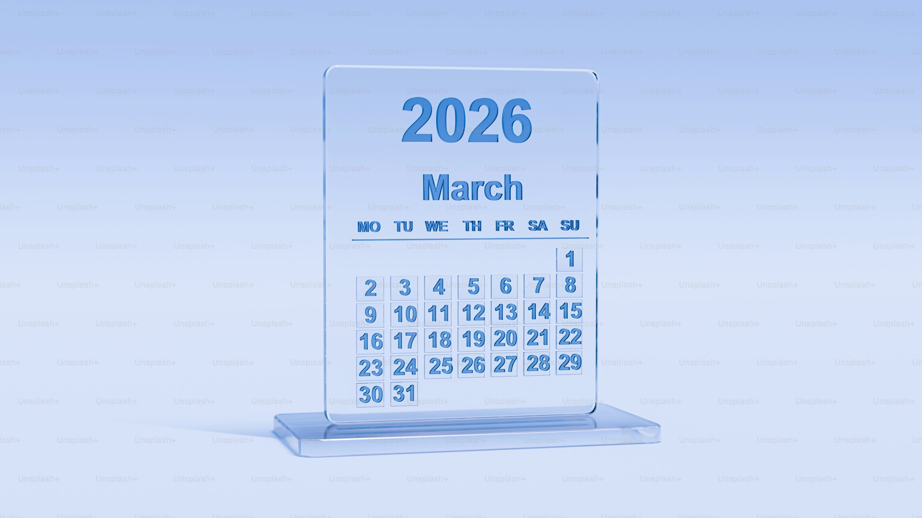 3000x1688 A calendar showing march 2026 on a light blue background. photo