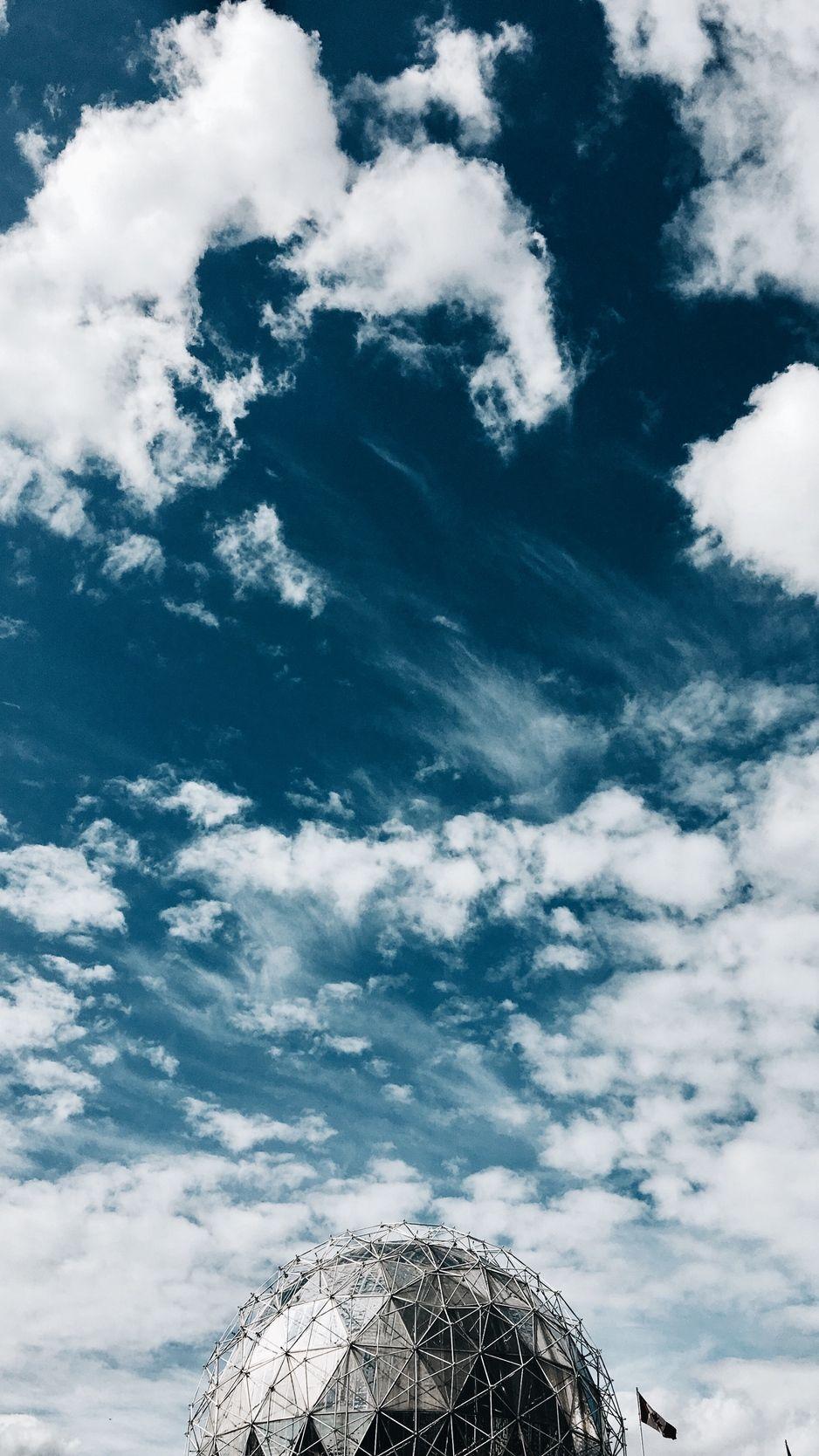 938x1668 Download wallpaper 938x1668 structure, sky, clouds, architecture