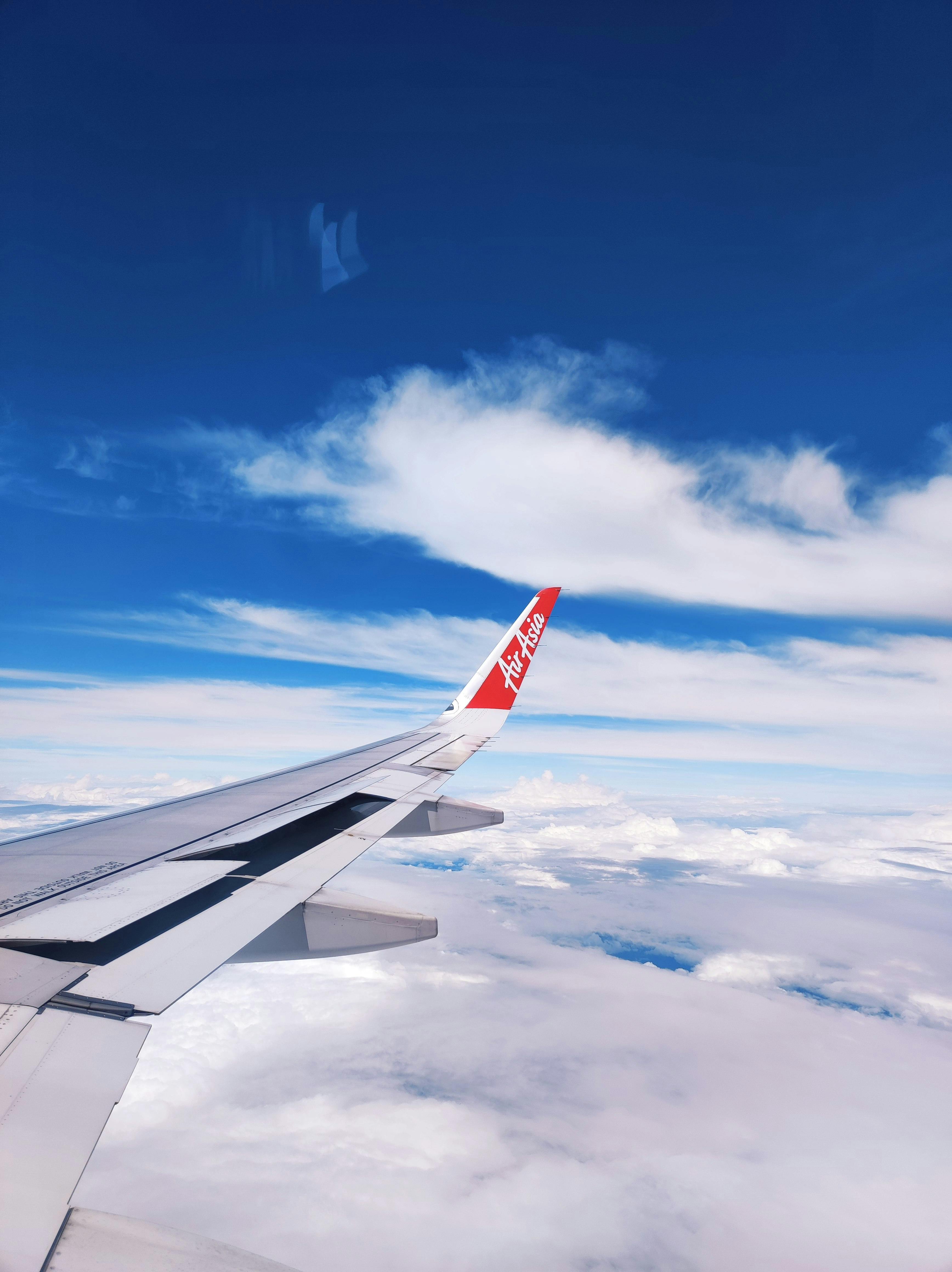 3472x4640 Airplane Wing Above Clouds in Sabah, Malaysia · Free