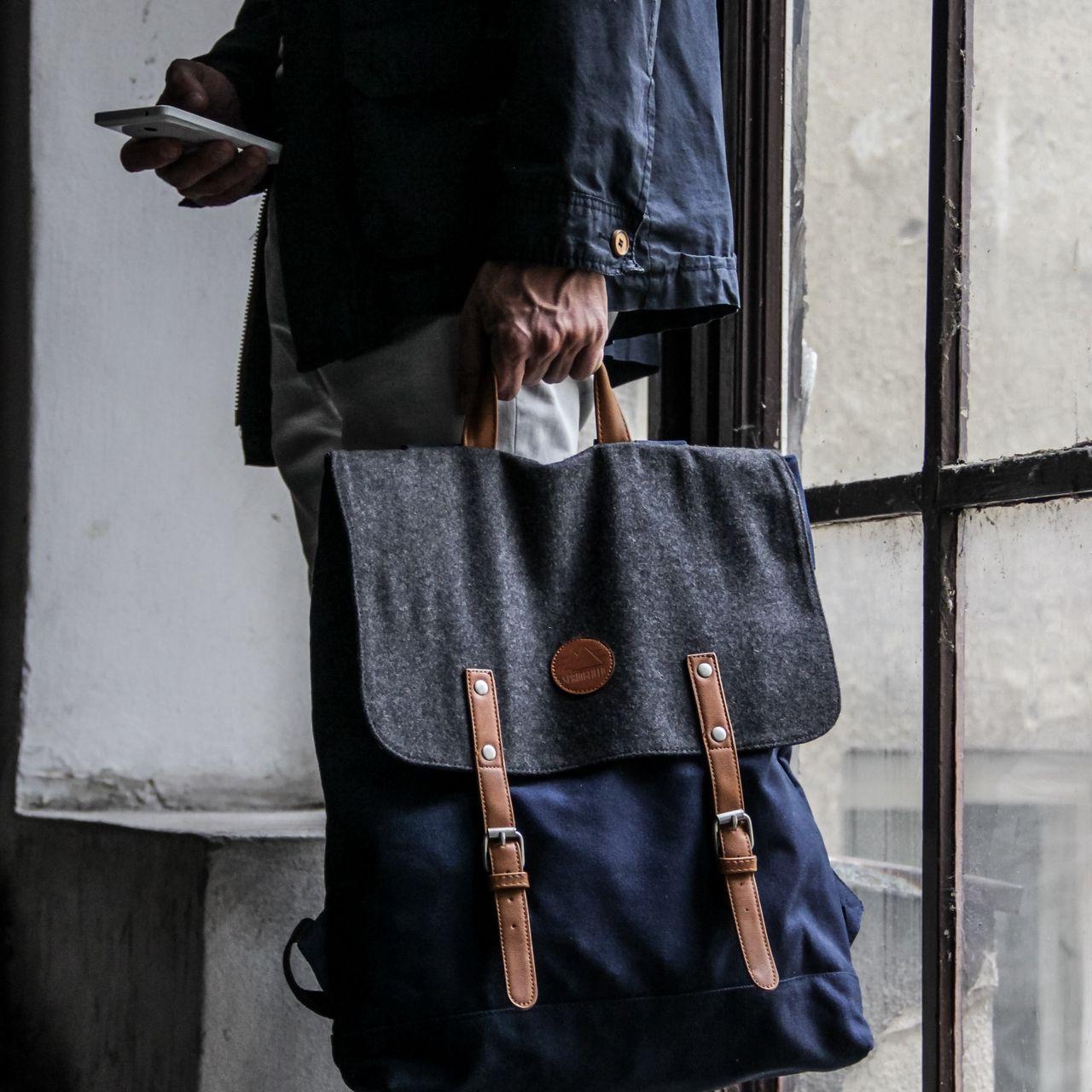 1280x1280 Download wallpaper 1280x1280 man, window, backpack, style, fashion