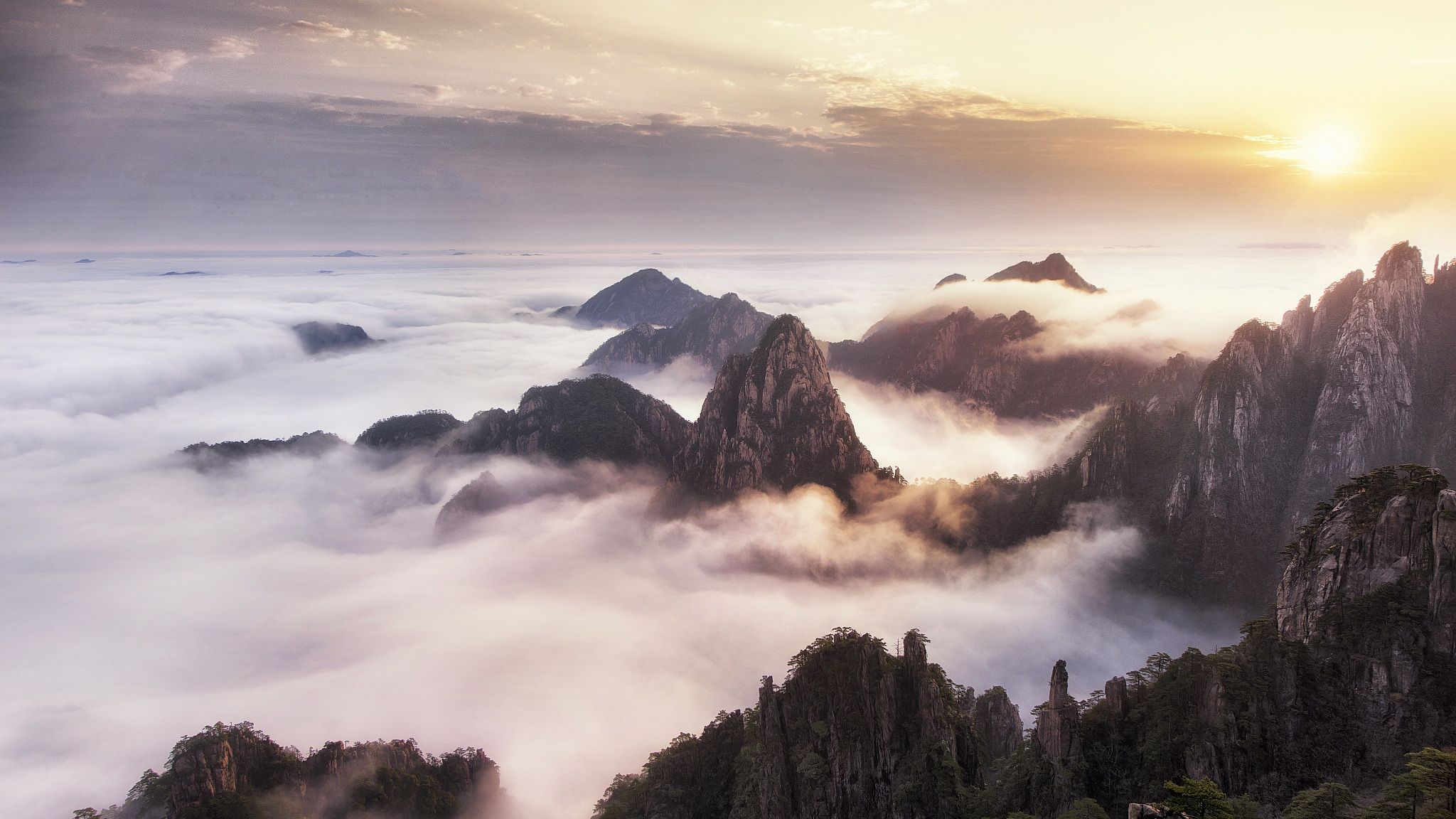 2048x1152 Clouds wrap mystical peaks of Mt. Huangshan