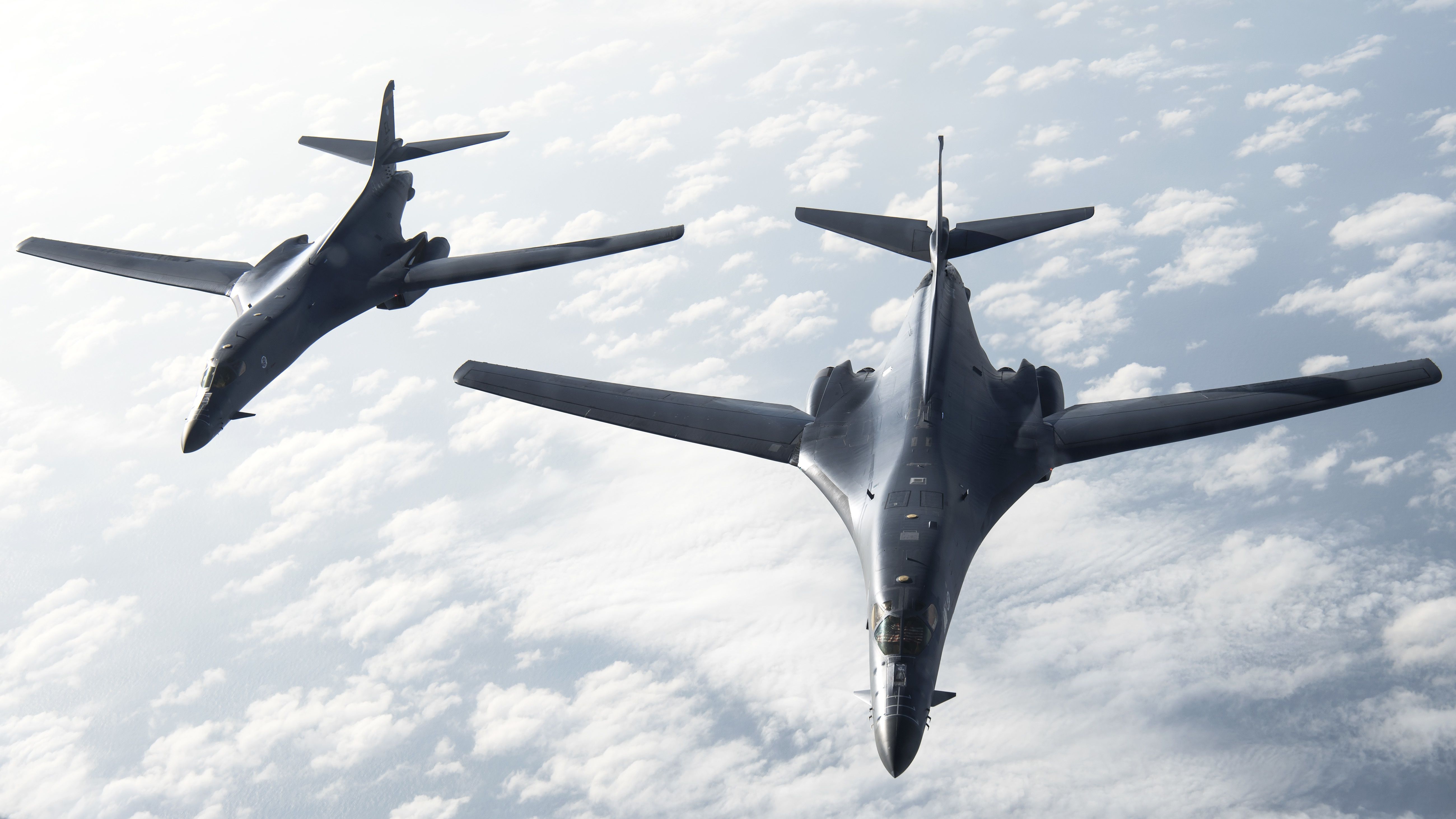 5200x2925 Rockwell B 1 Lancer Military Bomber HD Wallpaper In Flight Over Snowy Mountains