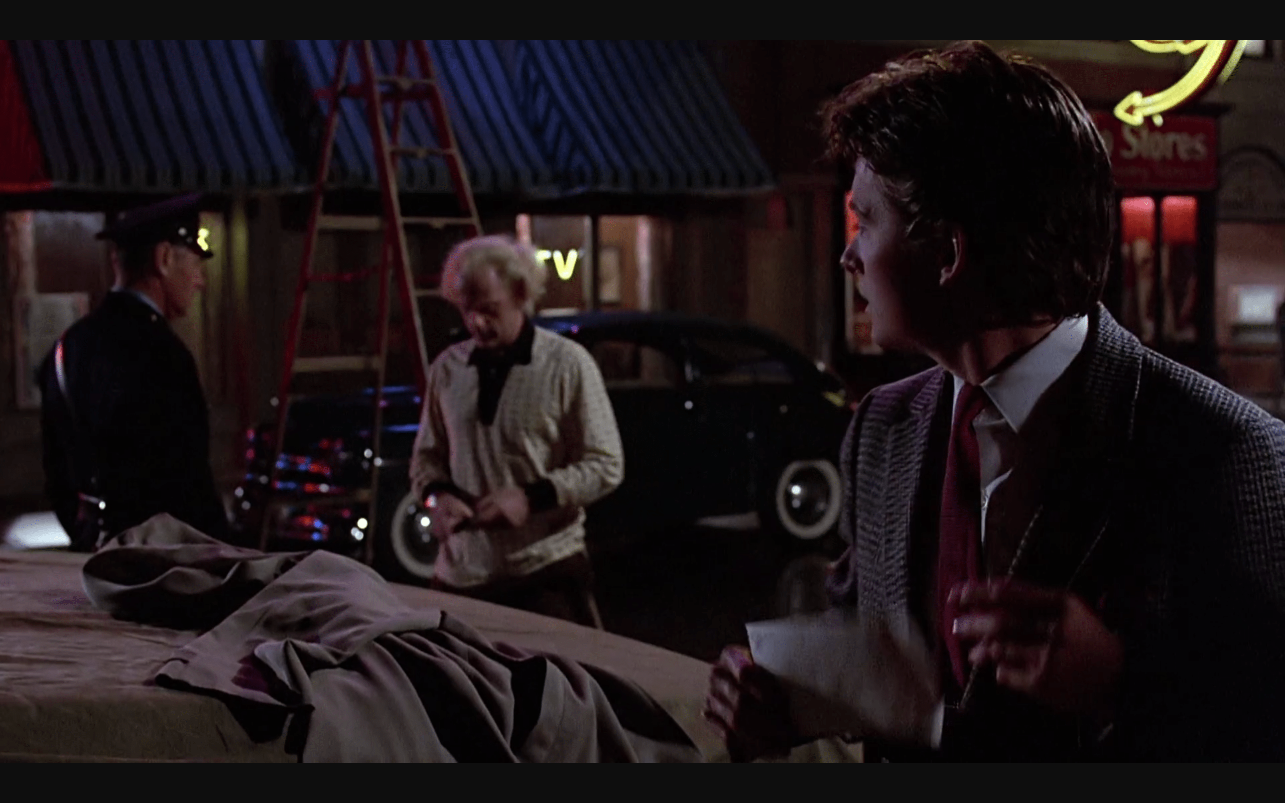 2560x1600 In Back to the Future, Doc Brown bribes a cop