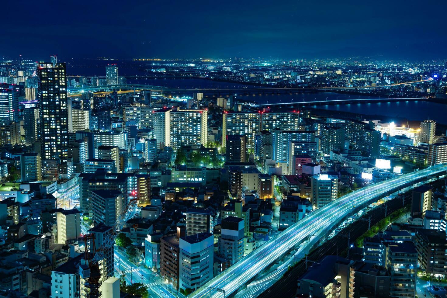1470x980 A night panoramic cityscape near Yodo river in Osaka wide shot