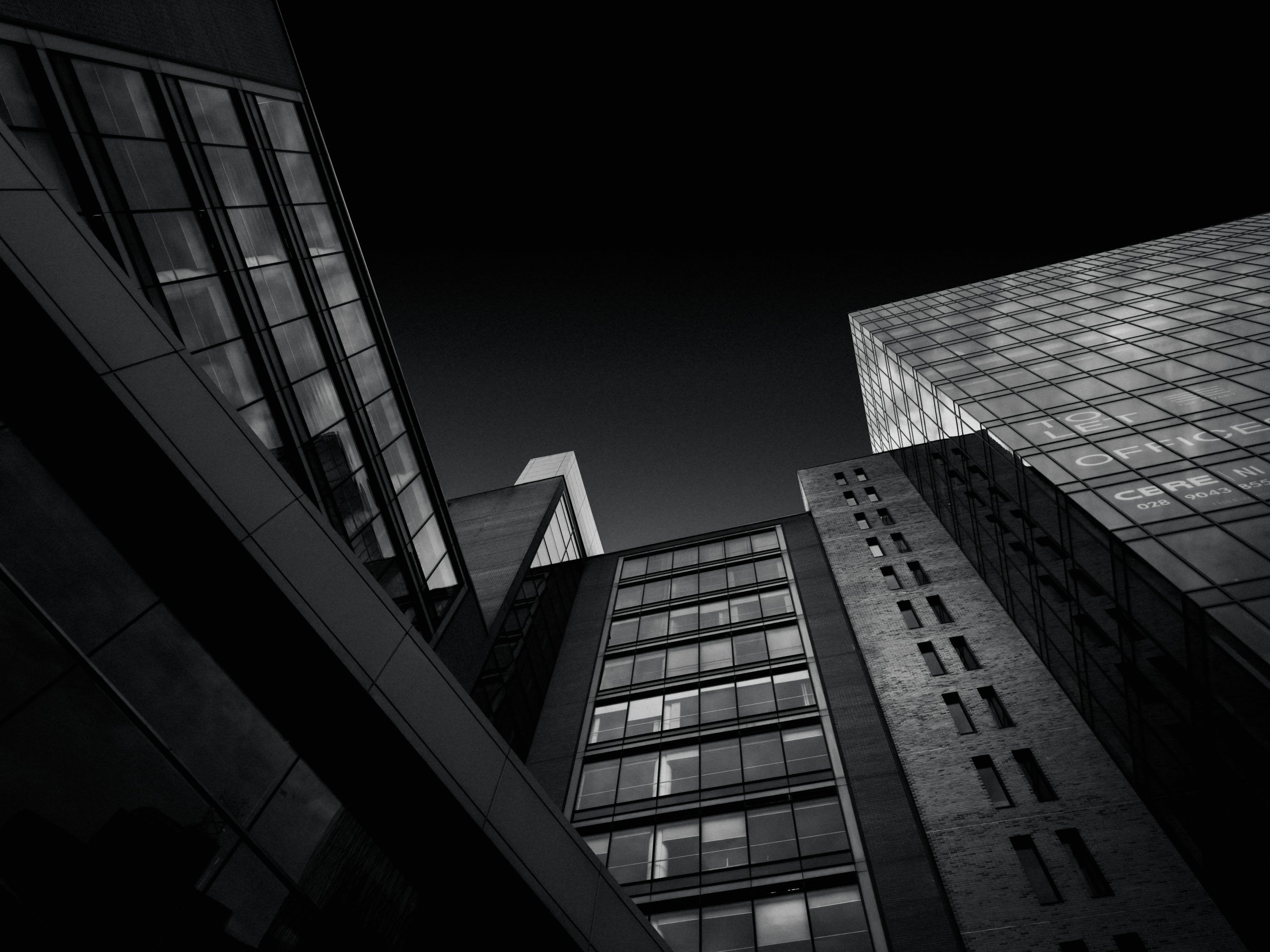 3000x2250 A black and white photo of tall buildings photo
