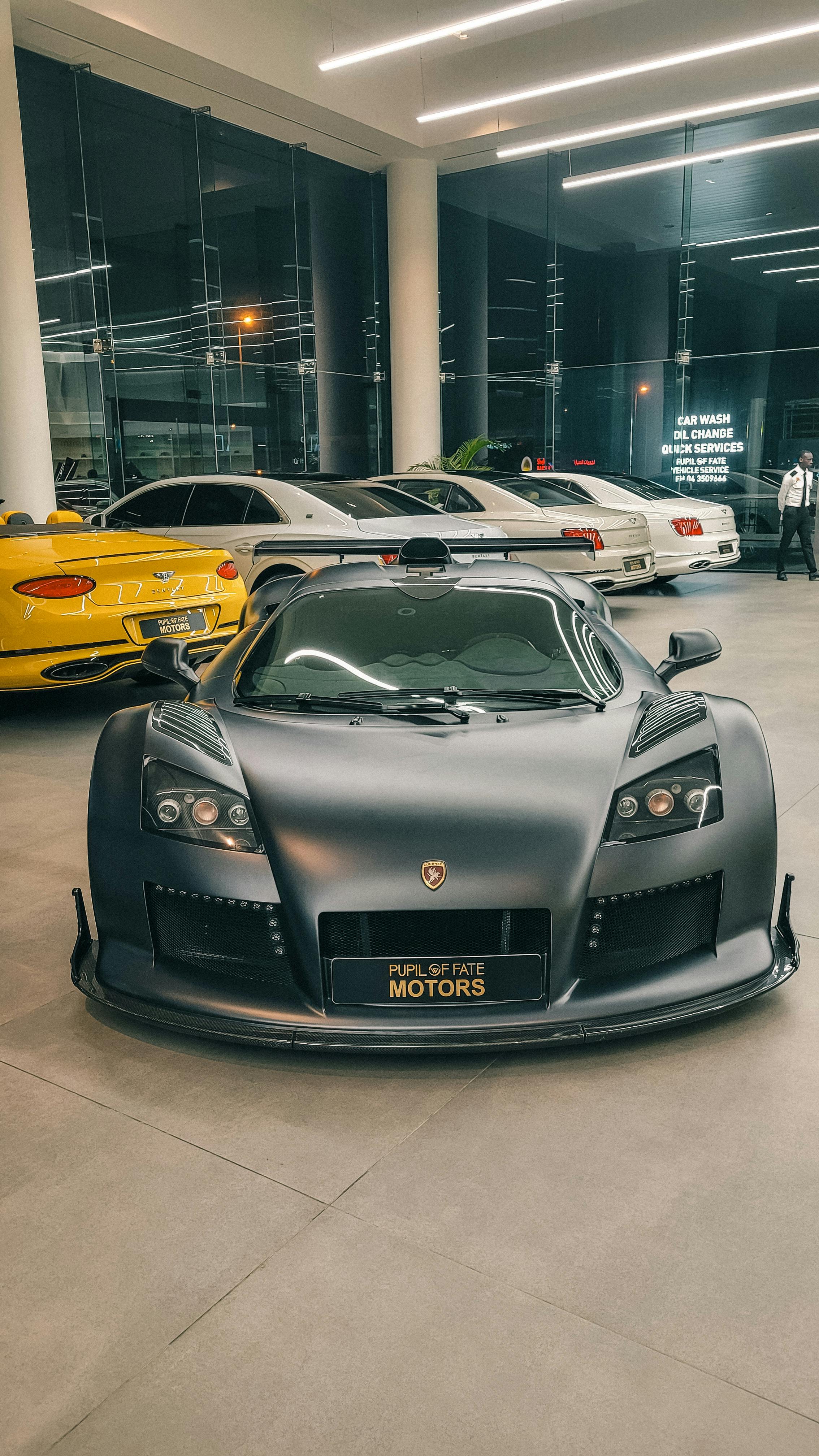 2268x4032 Silver Gumpert Apollo Car · Free