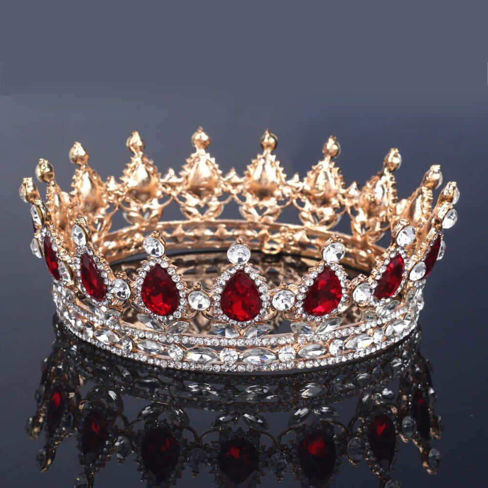 1000x1000 Download A Red Crown With Crystals On It Wallpaper