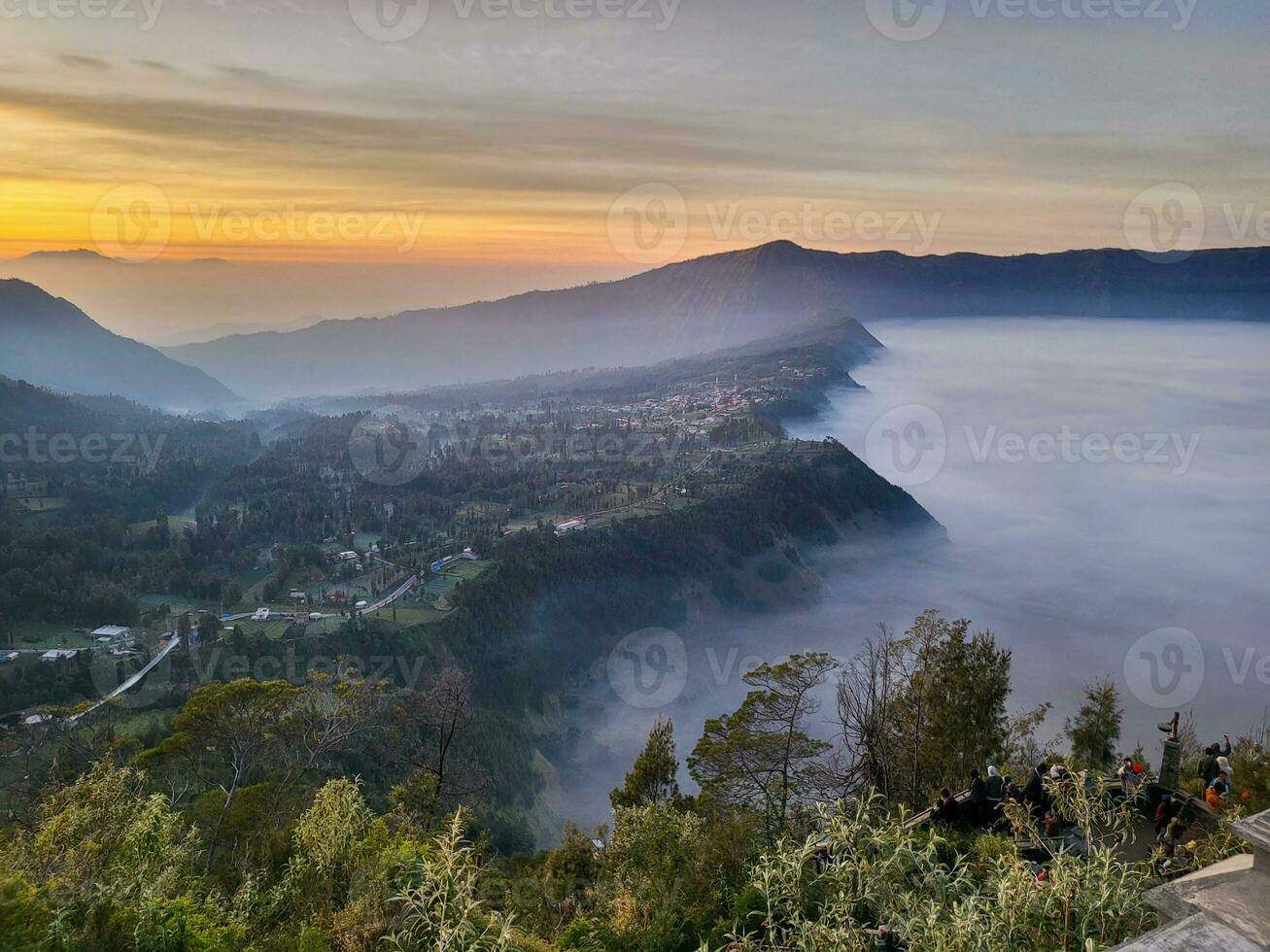 1307x980 Sunrise view from Penanjakan 2 or Seruni point below as the mist still covers the sea of sand of Mount Bromo, East Java, Indonesia. Beautiful Nature background and wallpaper. 33047580