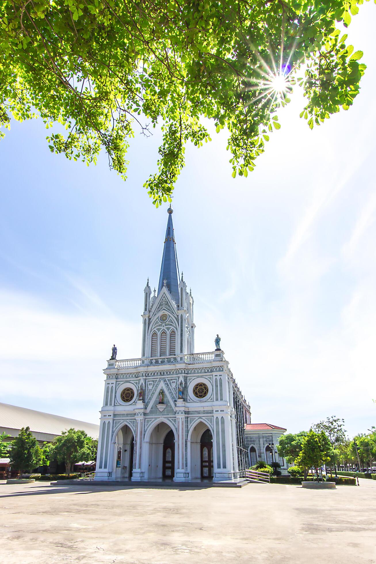 1307x1960 Beautiful Christian Church In The Blue Sky Thailand landmark in samutsongkram