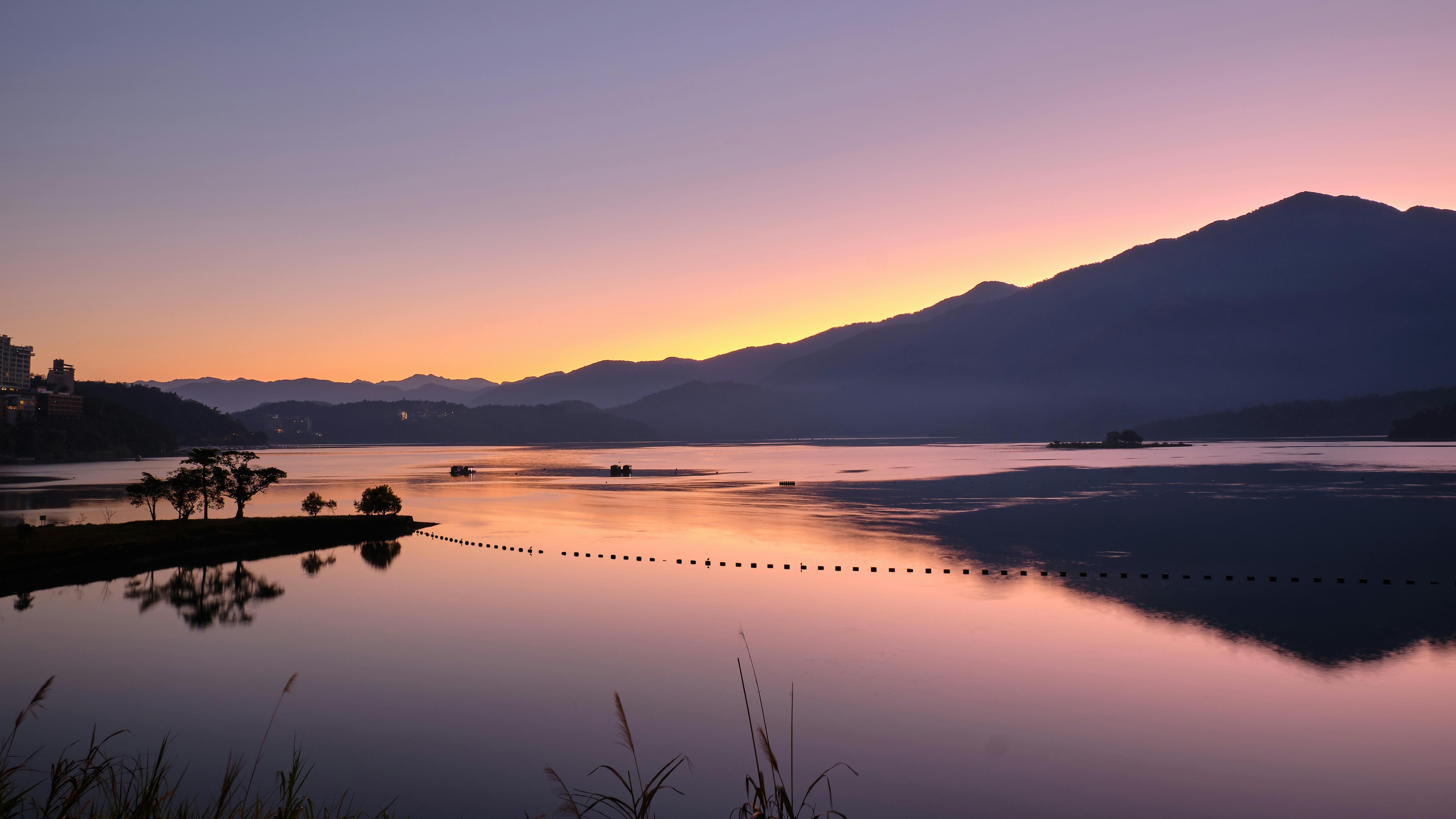 6085x3423 Landscape Scenery of a Placid Lake Across the Mountain Range during Golden Hour · Free