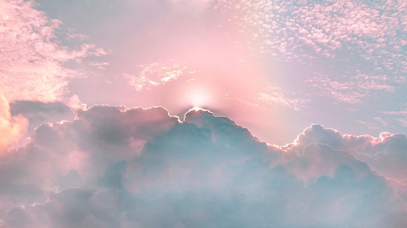 1366x768 Download wallpaper 1366x768 clouds, porous, rainbow, sky, shine, rays tablet, laptop HD background