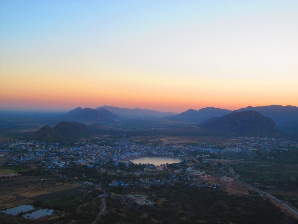 1024x768 The Sunrise in Pushkar Battered Suitcase