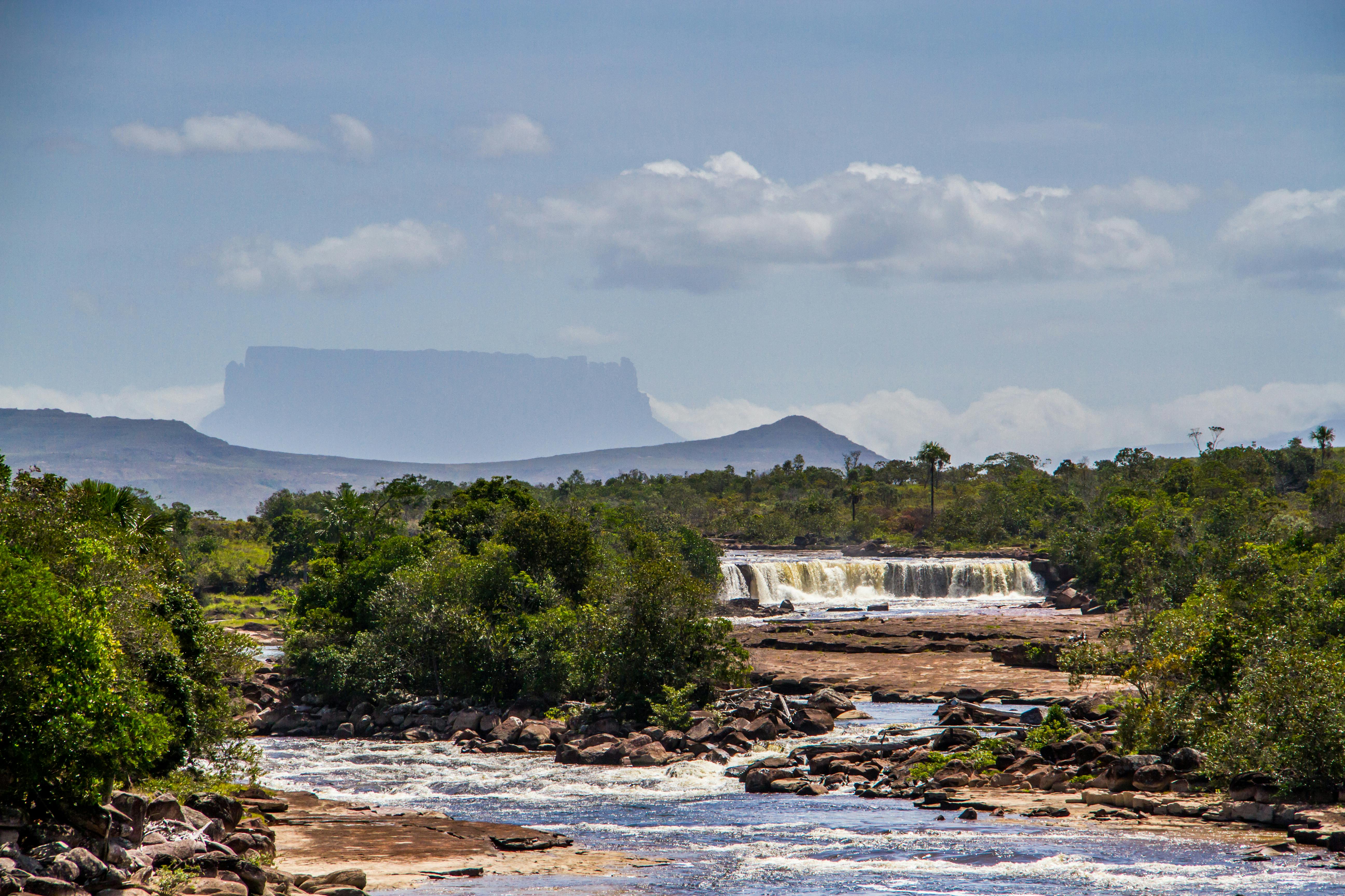 5184x3456 Scenic Panorama with River Cascade and a Distant Tepui Mountain, Canaima National Park, Venezuela · Free