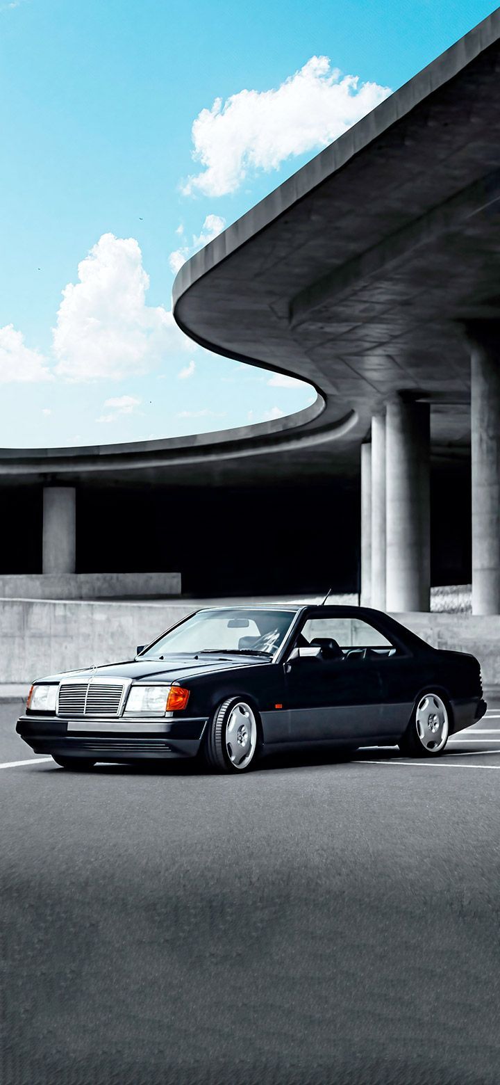 720x1560 Classic Mercedes coupe near a concrete building