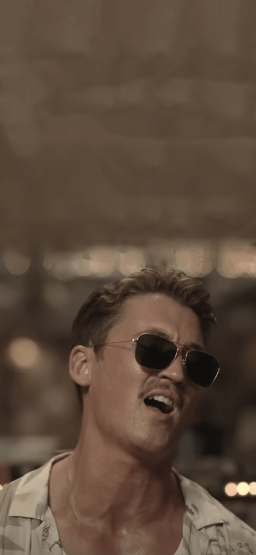 828x1792 Miles Teller Top Gun Wallpaper