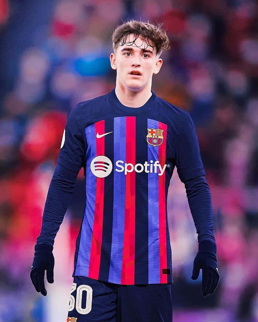 850x1062 Download F C Barcelona Midfielder Gavi In Action Wallpaper