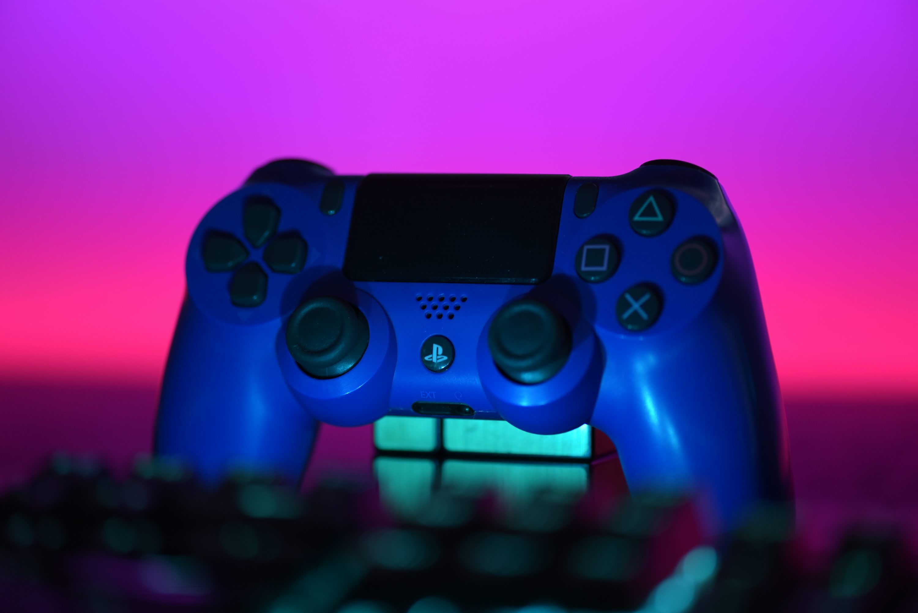 3000x2003 A close up of a video game controller photo