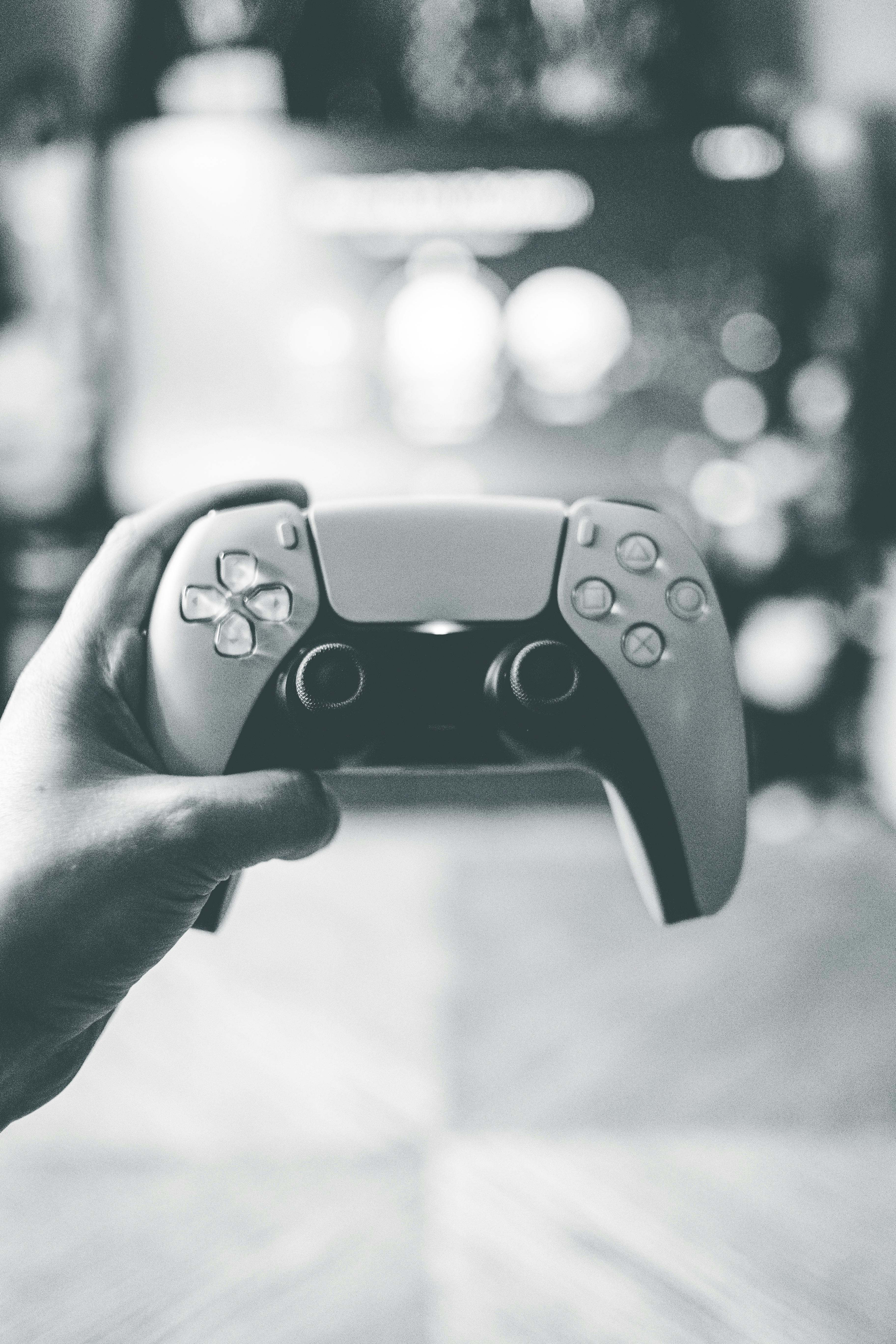 3648x5472 Person Holding Sony Ps4 Dualshock 4 · Free