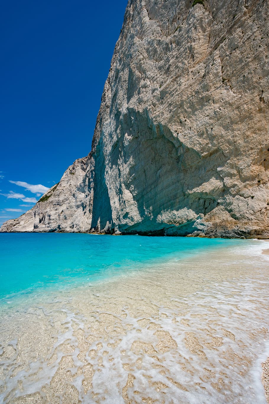 910x1365 greece, shipwreck beach, blue, rocky, rock, ocean, water, wreck beach