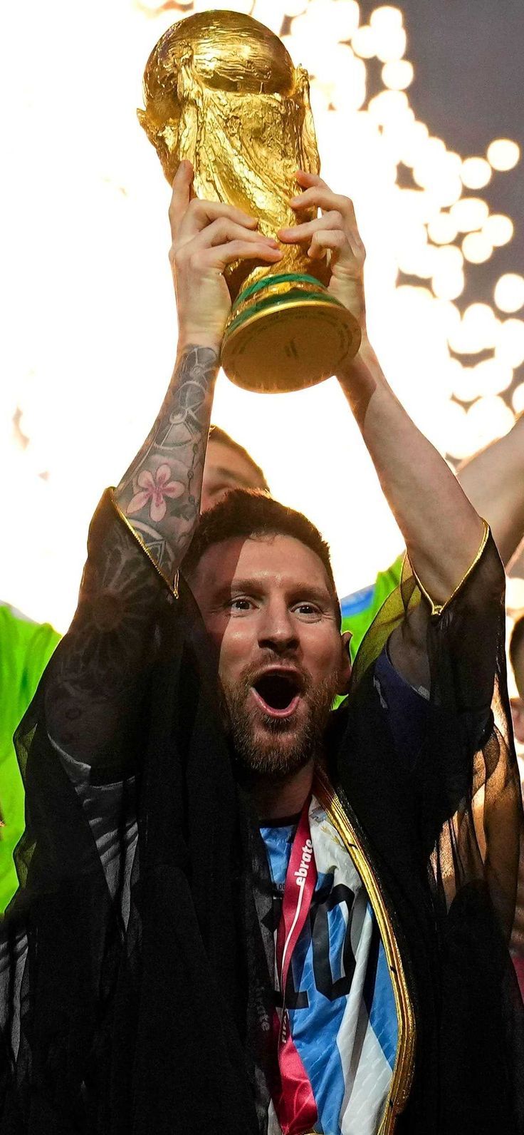 736x1592 Messi Lifting World Cup Wallpaper