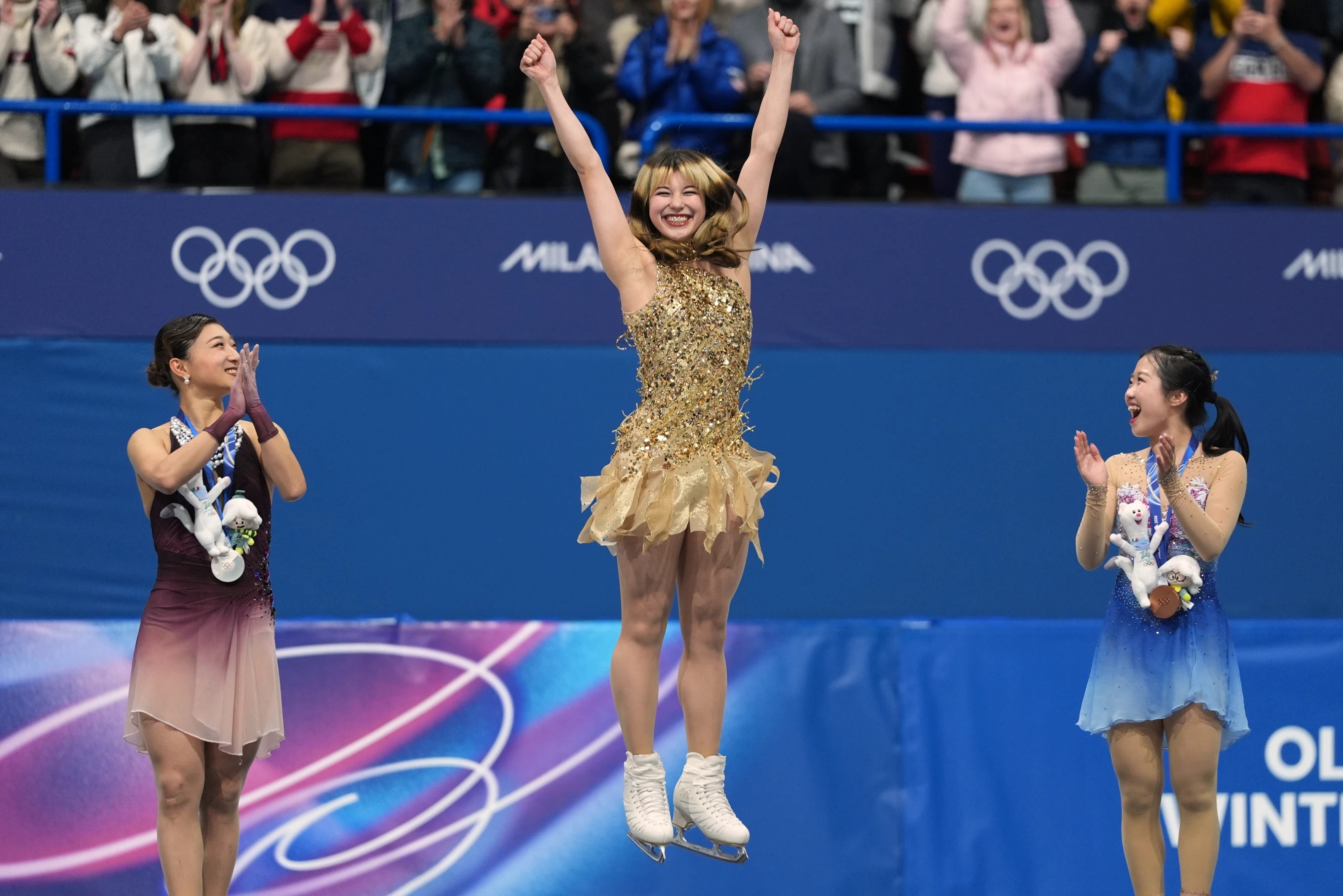 2720x1814 Alysa Liu leaping with arms raised in celebration after winning gold at the 2026 Winter Olympic