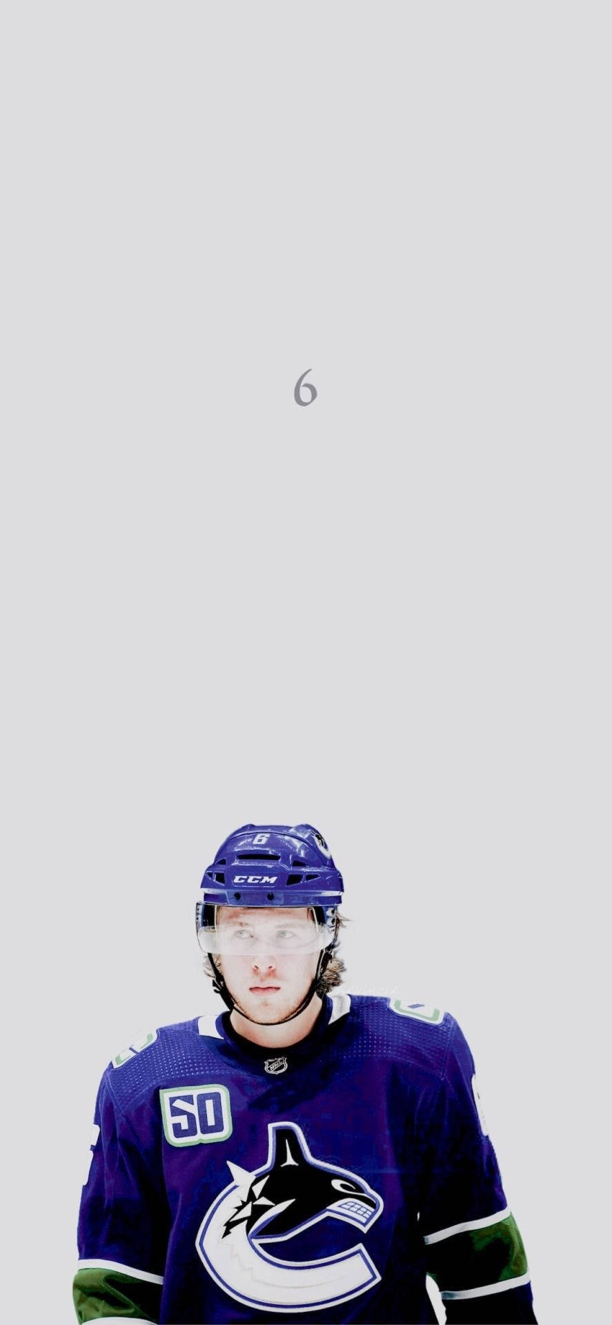 887x1920 Download Quinn Hughes Looking In Front With White Background Wallpaper