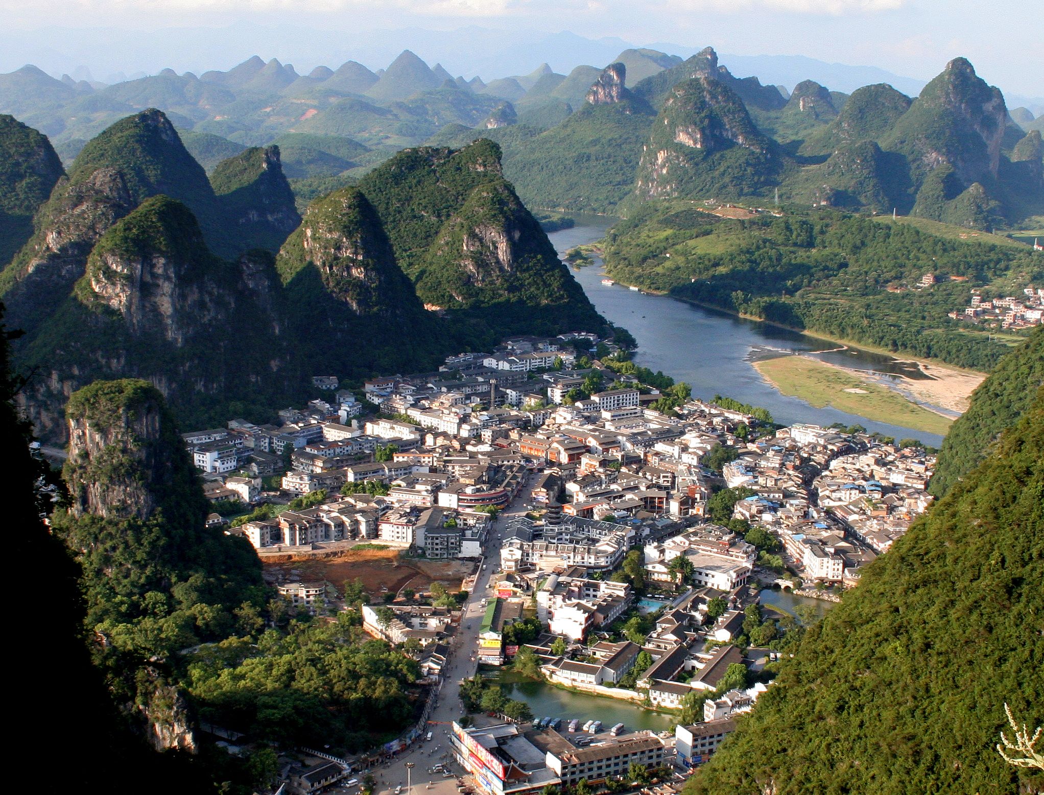 2044x1557 Yangshuo Serenity: Stunning Man Made Town Amidst China's Majestic Mountains HD Wallpaper