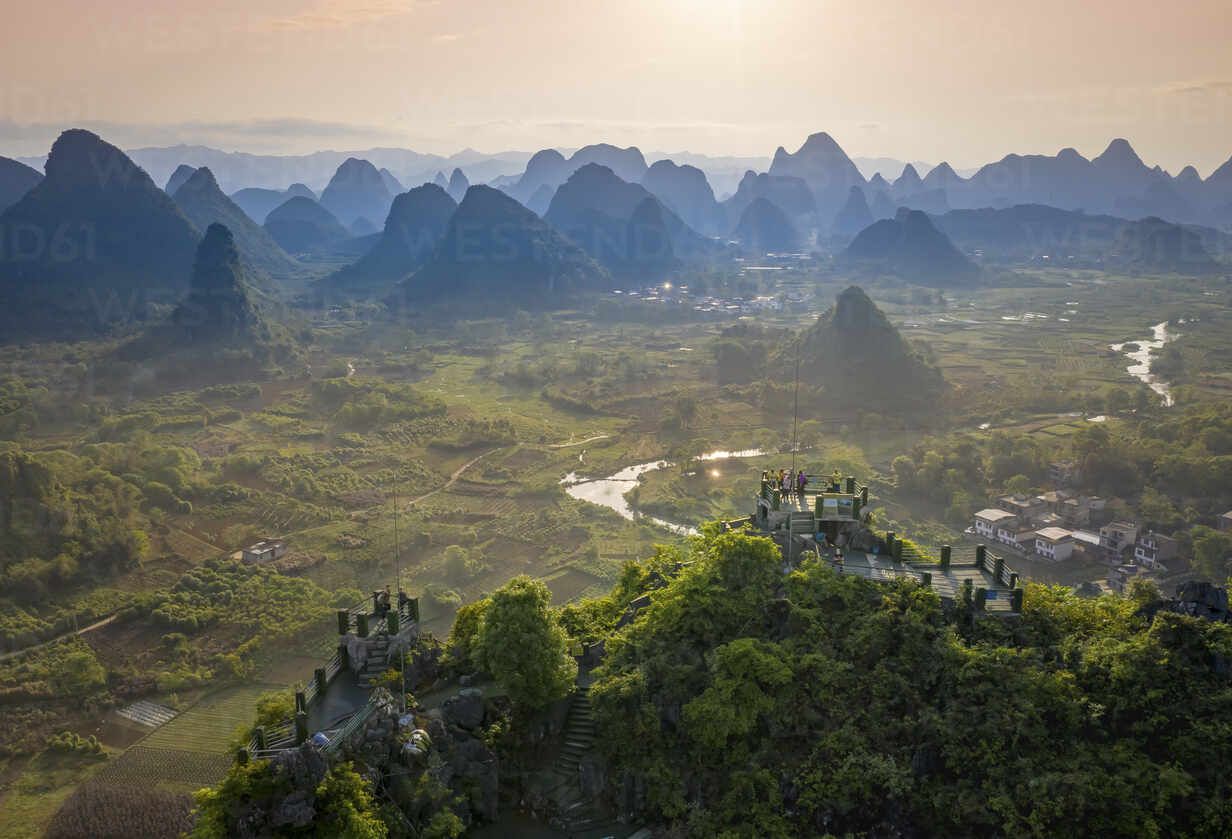 1232x839 Aerial view of Moon Hill Yangshuo, a scenic hilly landscape, Yangshuo County, Guilin, Guangxi Zhuang Autonomous Region, China