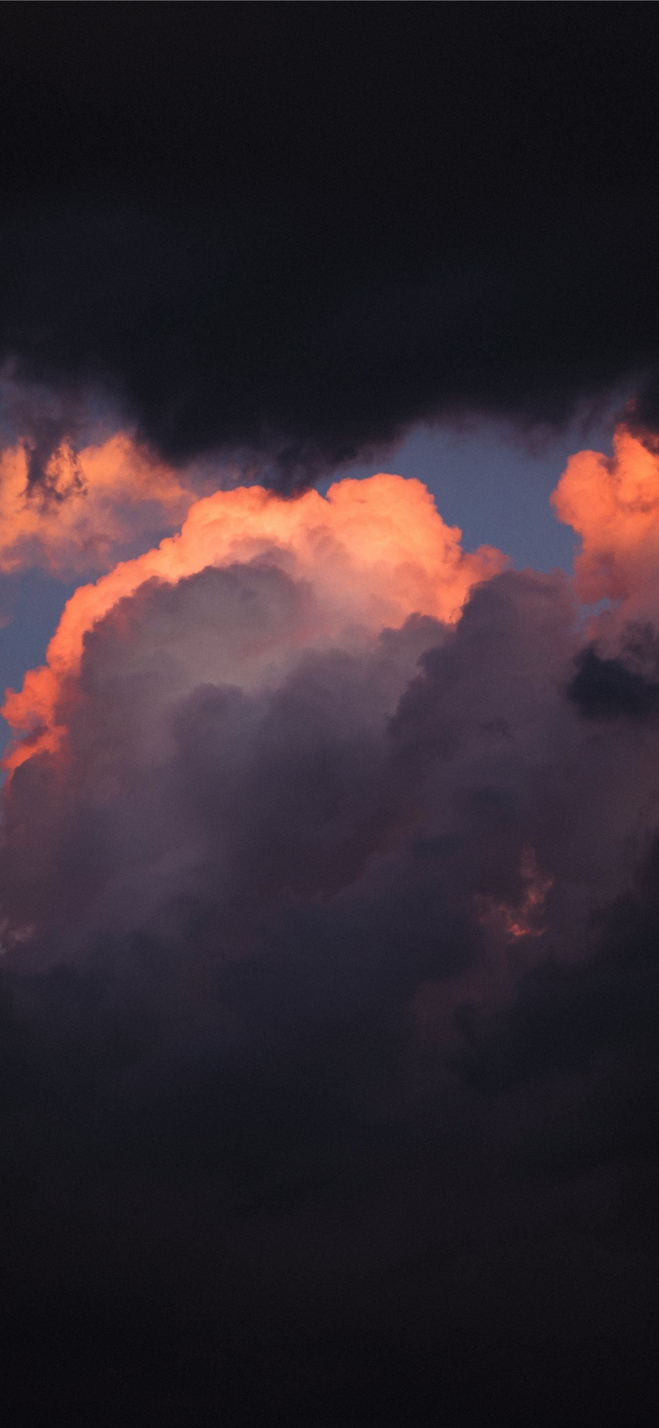 1290x2796 Dramatic sunset clouds with vibrant orange glow iPhone Wallpaper Free Download